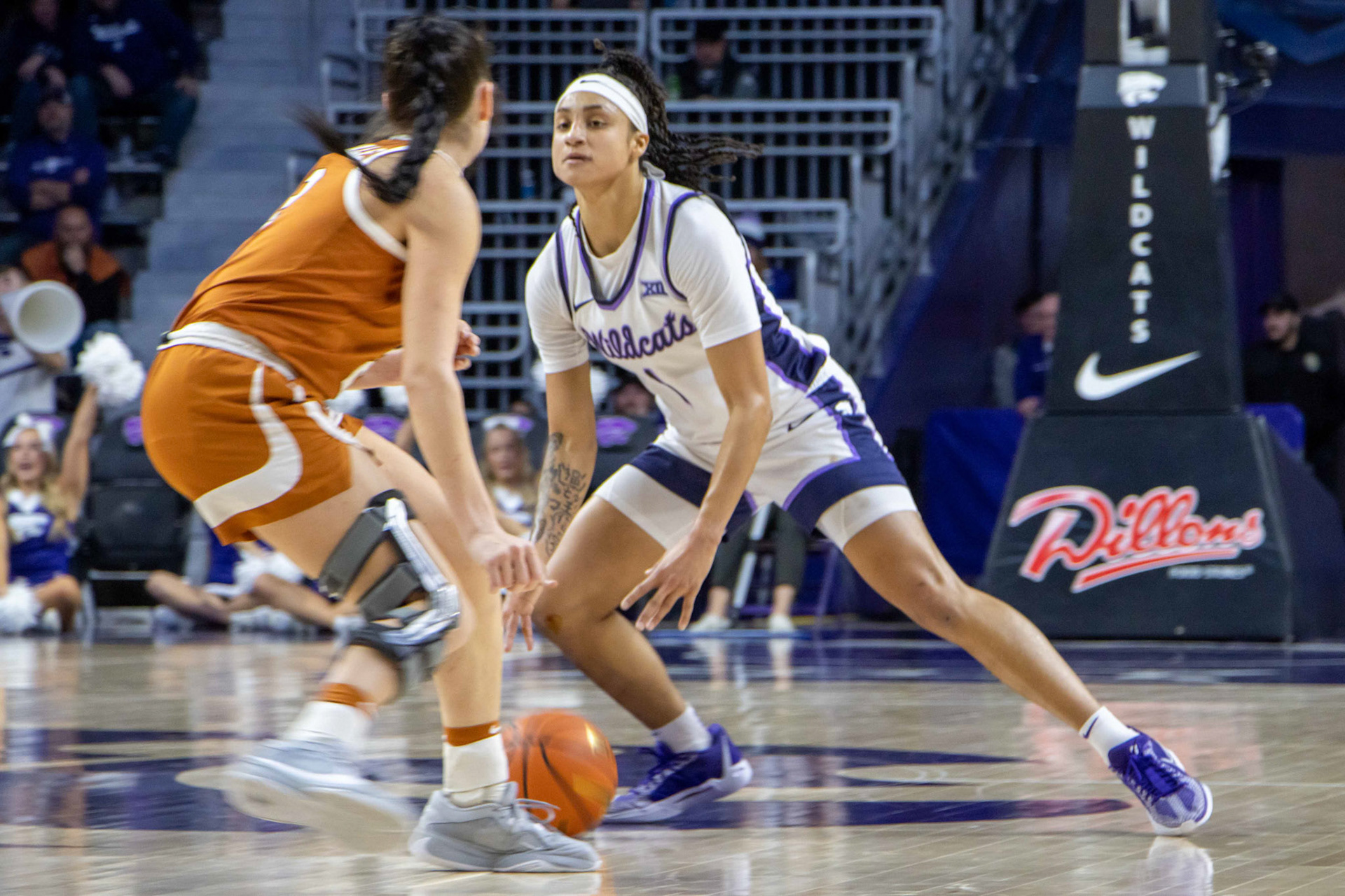 Guard Zyanna Walker looks to get past Texas guard Shaylee Gonzales. No. 12 K-State beat No. 10 Texas 61-58 Jan. 13, 2024.
