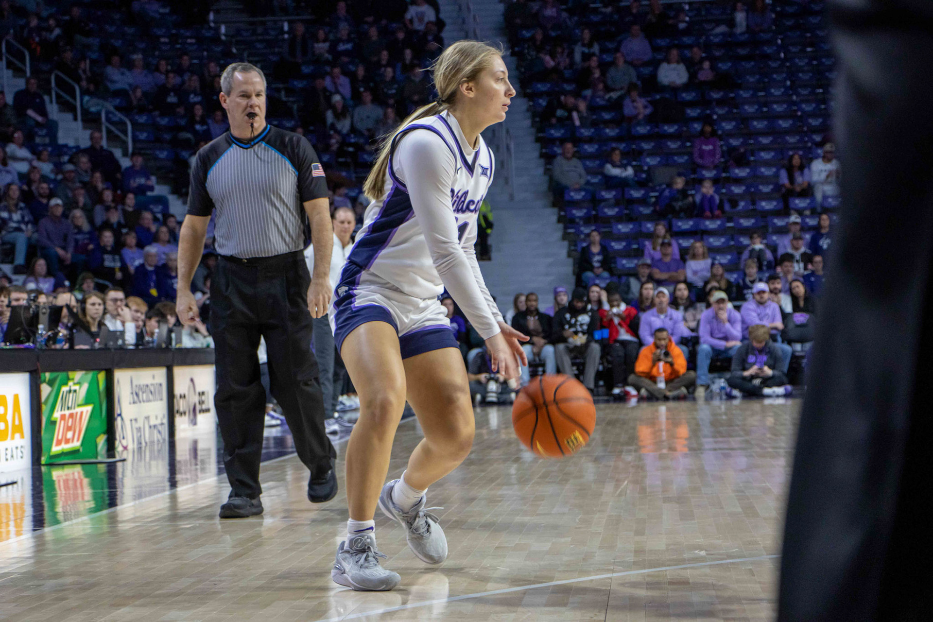 Guard Taryn Sides dribbles down the court in the Texas game on Jan. 13, 2024. Sides saw limited playing time as the Wildcats took down Texas 61-58.