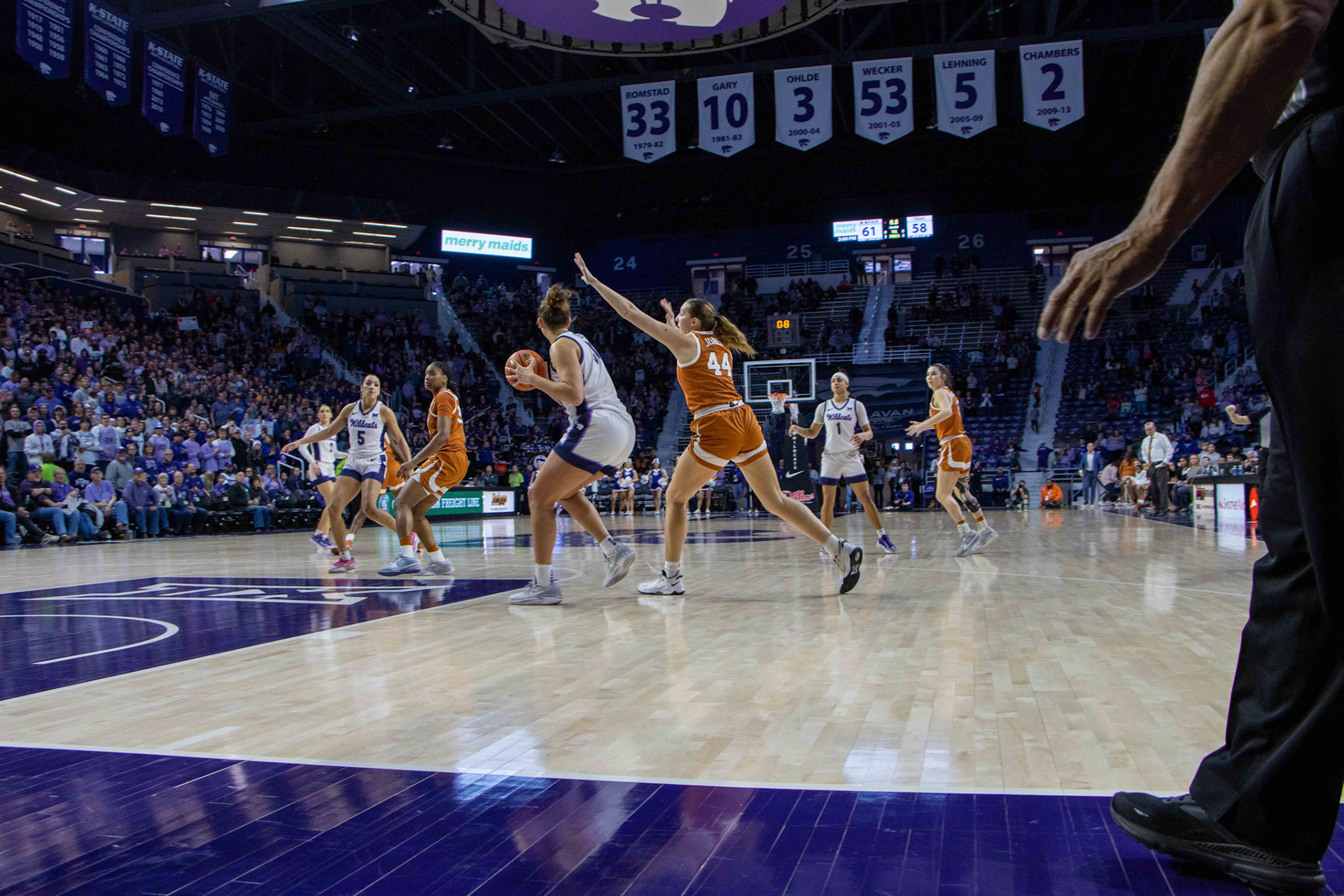 Center Ayoka Lee holds on to the ball as the final seconds of the Texas game wind down. K-State closed the game 61-58 to beat No. 10 Texas Jan. 13, 2024.