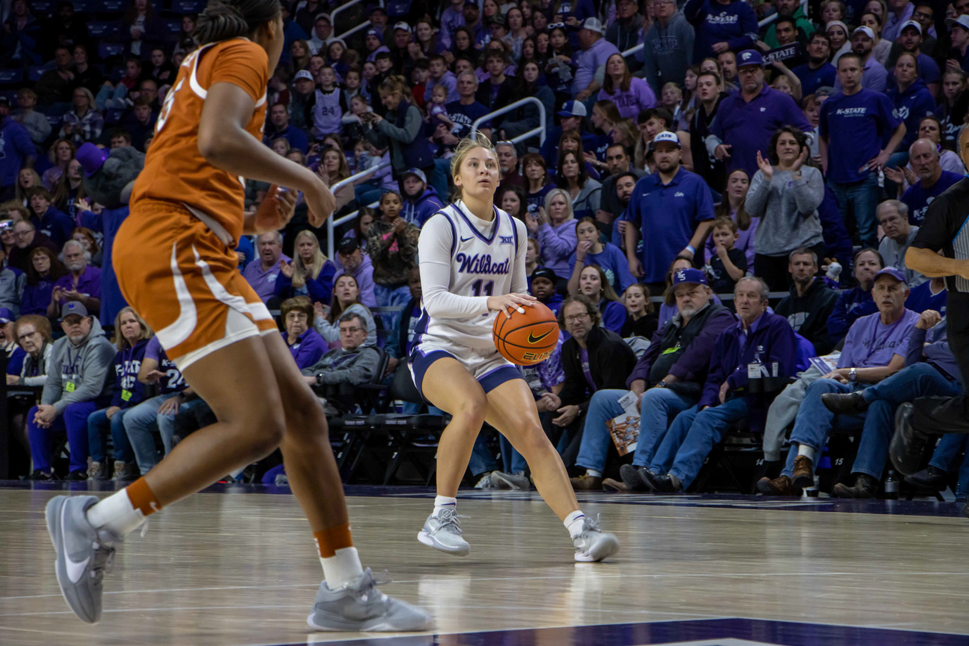 Guard Taryn Sides pulls up to shoot a 3 in the second quarter of the Texas game. No. 12 K-State beat No. 10 Texas 61-58 Jan. 13, 2024.