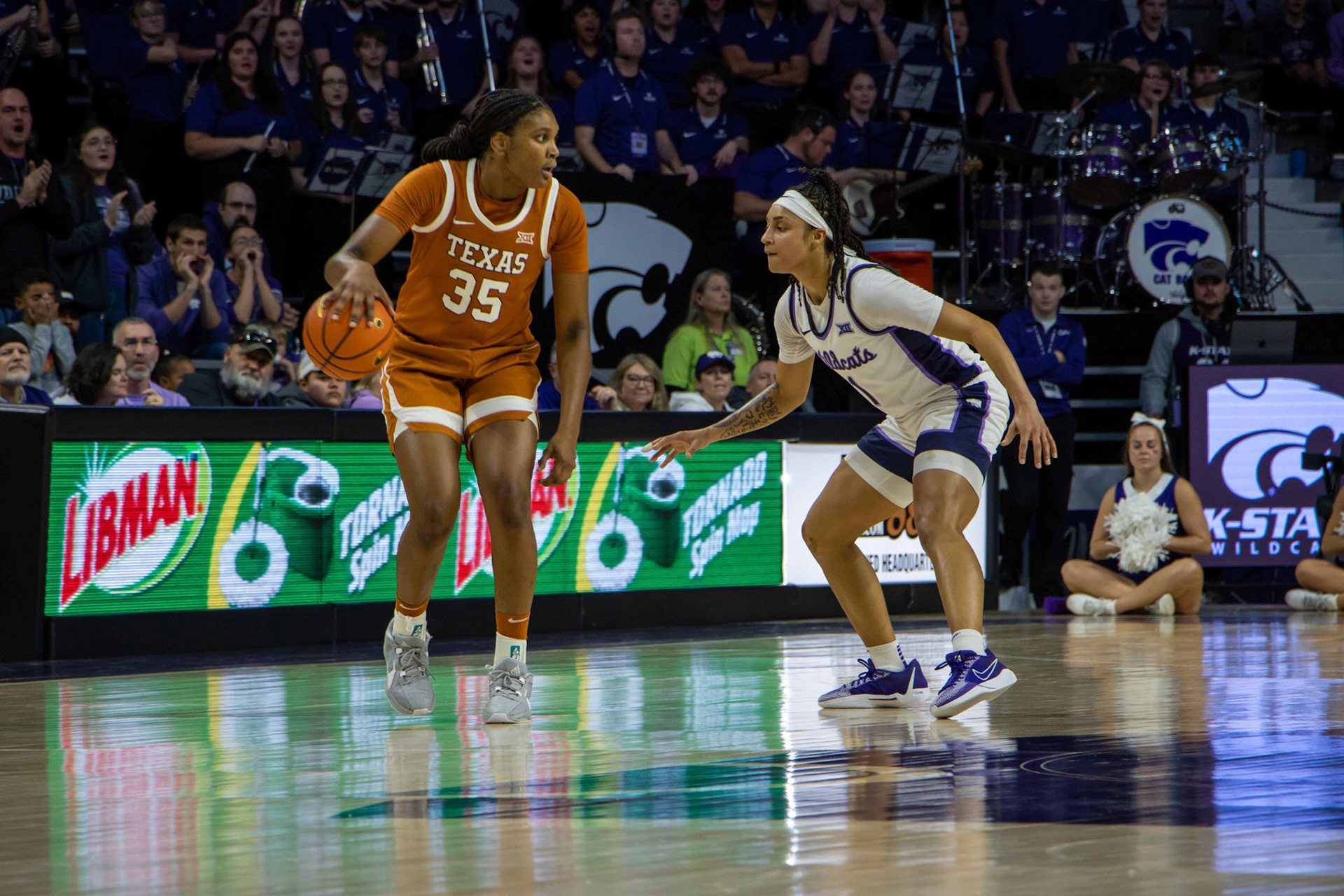 Guard Zyanna Walker guards Texas forward Madison Booker in the fourth quarter. No. 12 K-State beat No. 10 Texas 61-58 Jan. 13, 2024.