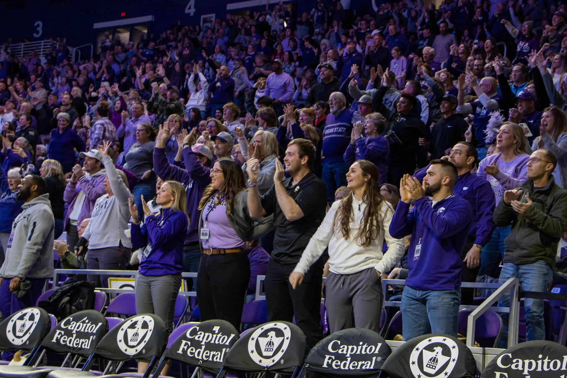 Fans rise to their feet following guard Zyanna Walker's 3-point third quarter buzzer beater. Walker's 3 gave K-State the lead back going into the fourth 46-45.