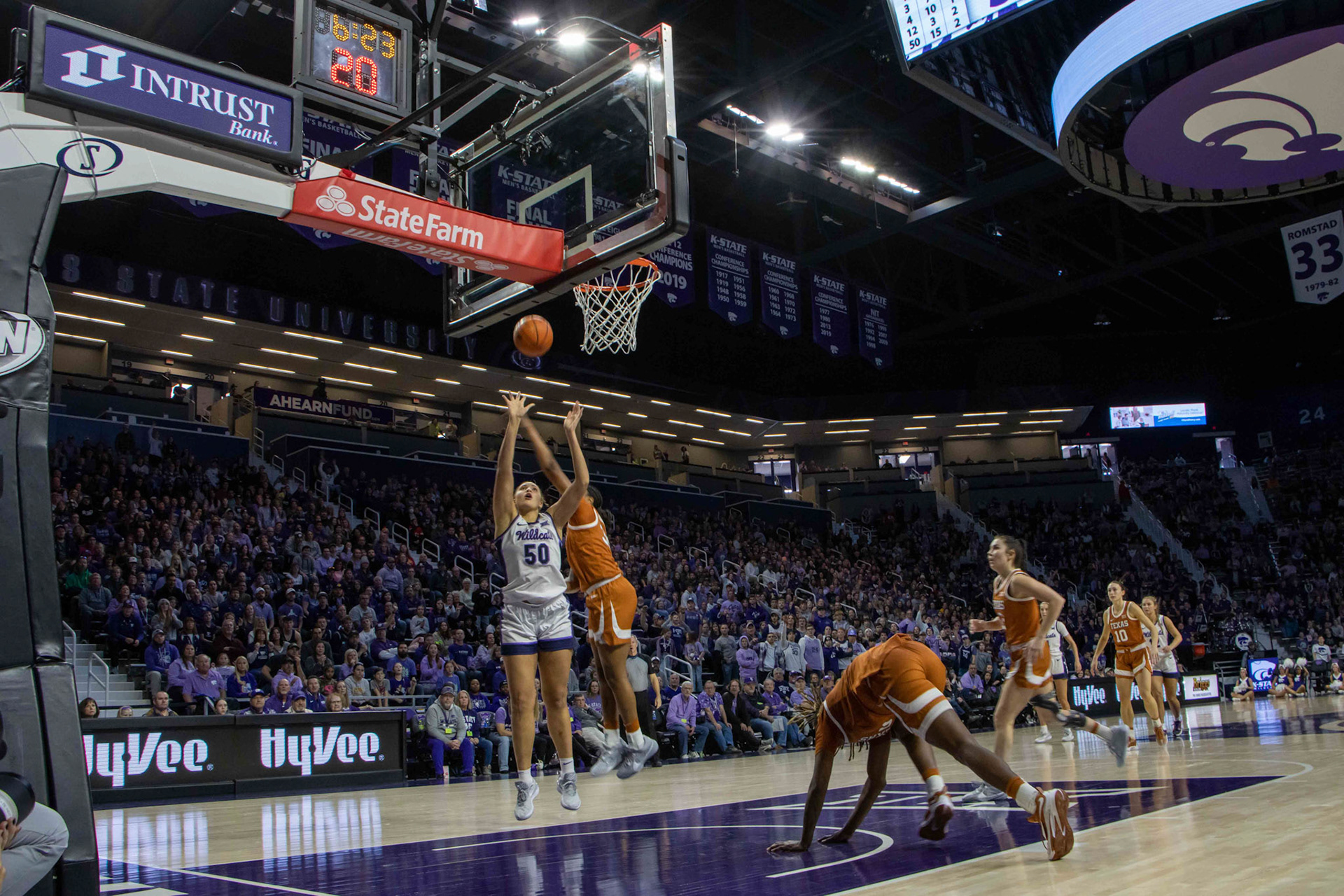 Center Ayoka Lee gets an offensive rebound and immediately goes up for two. The ball fell in, giving Lee her 19th point of the game.