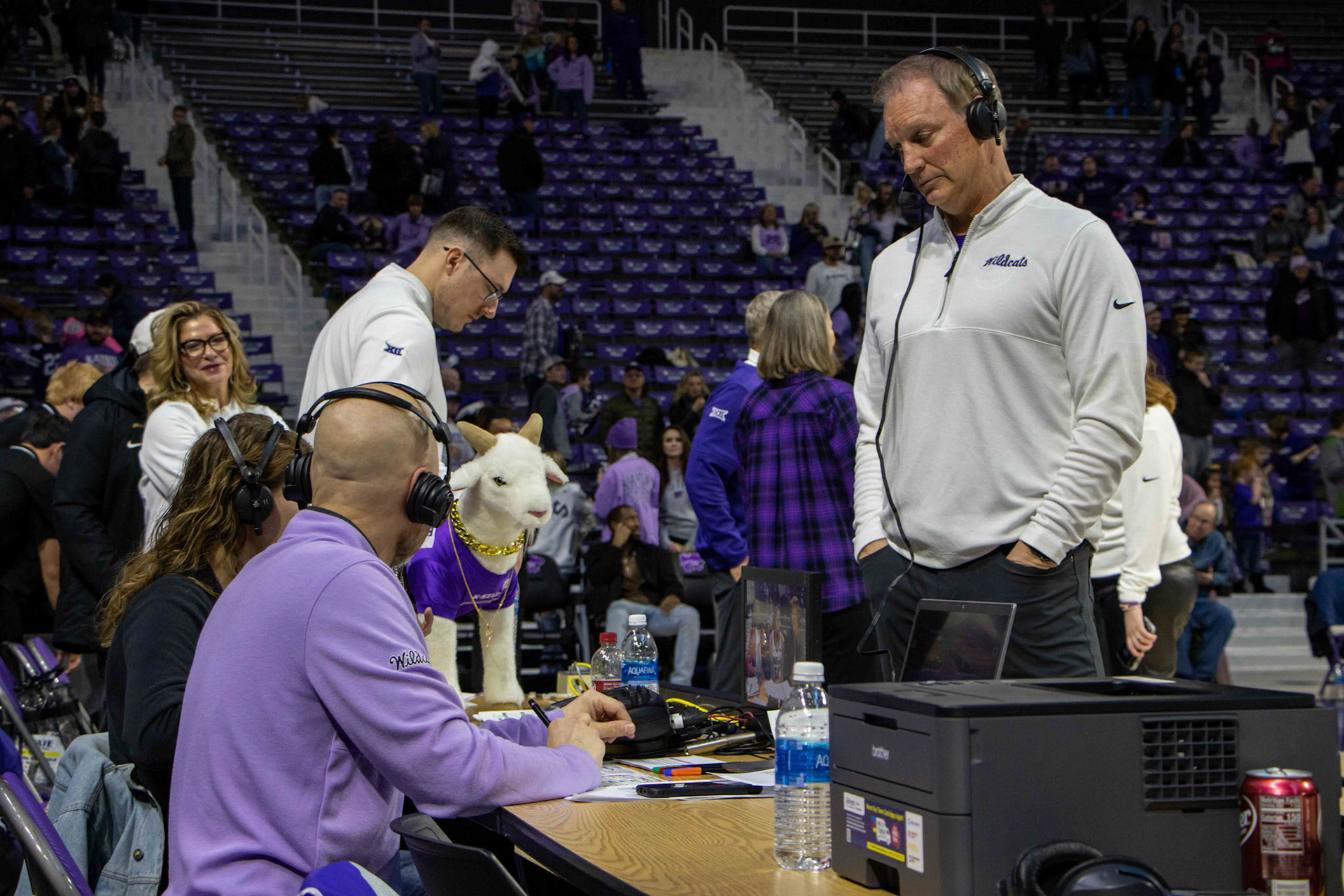 Head coach Jeff Mittie attends to a sideline interview with Gap Goat present after defeating Texas 61-58 Jan. 13, 2024. The Wildcats move to 17-1 on the season and remain undefeated in conference play with the win.