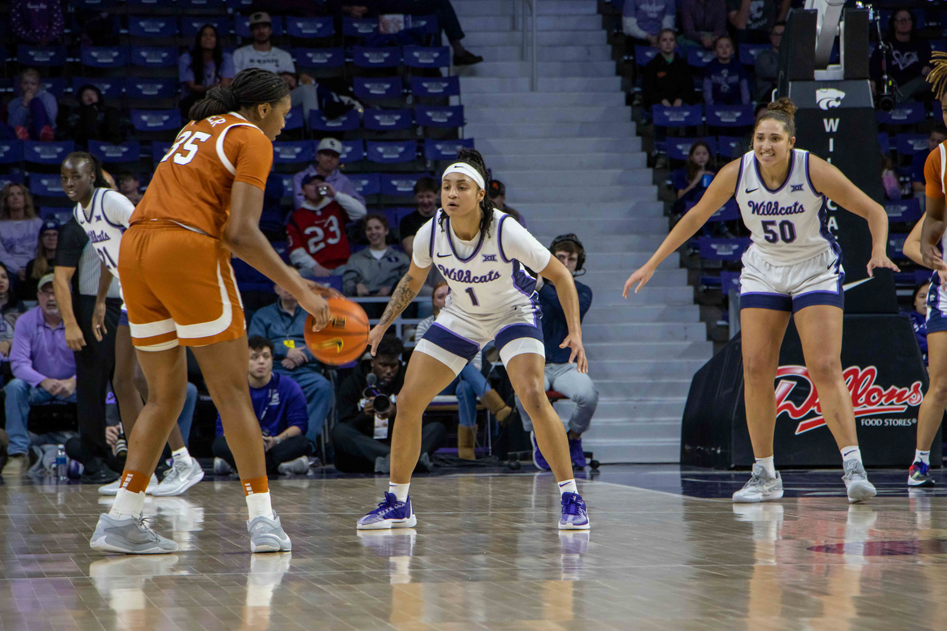 Guard Zyanna Walker defends against Texas forward Madison Booker looking for an opening. Booker would miss the jumper while Walker grabbed the rebound, ending the first quarter 18-16 Texas.