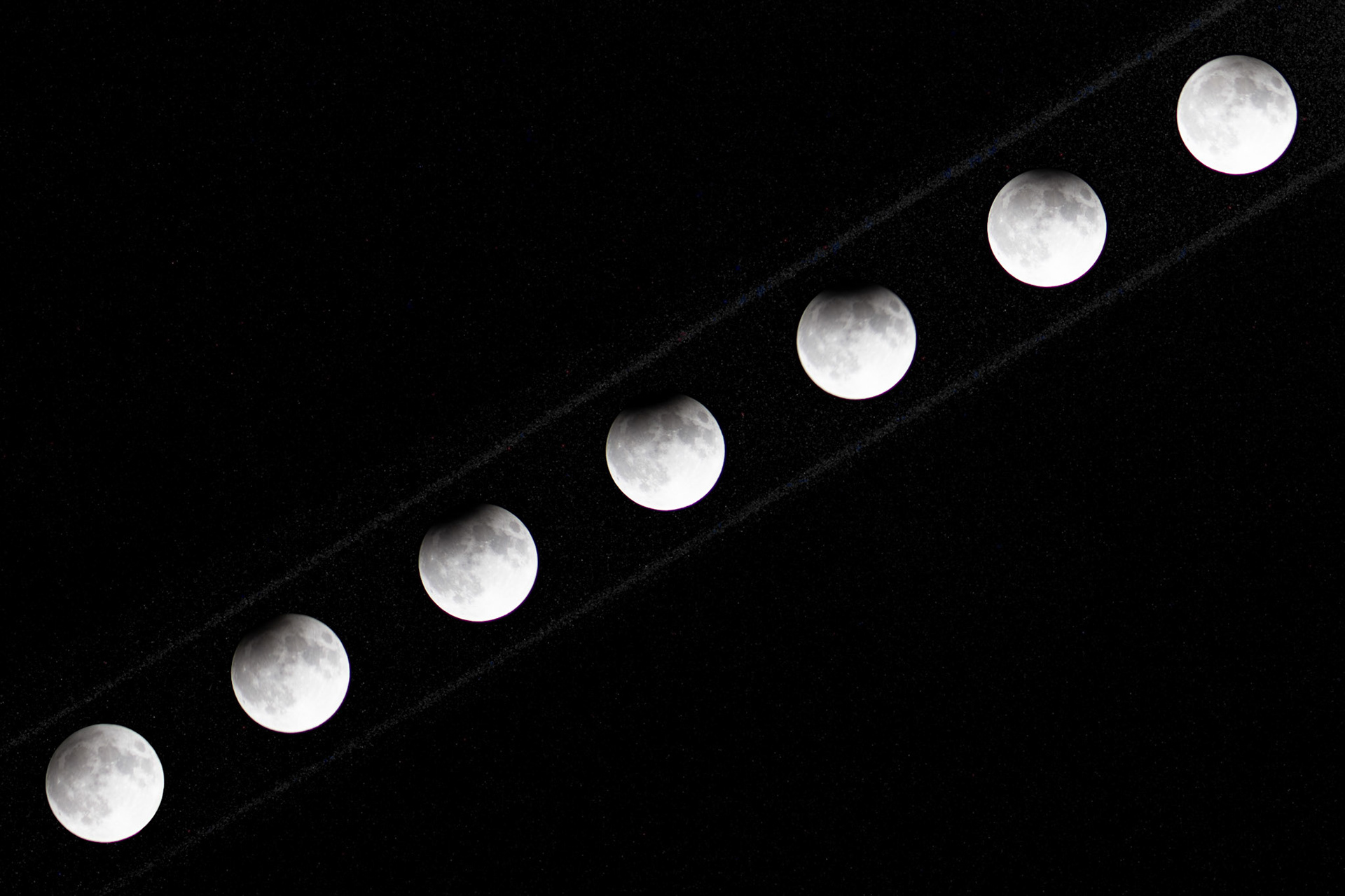 Photo stack of the moon thoughtout the eclipse, each about 10-20 minutes apart.