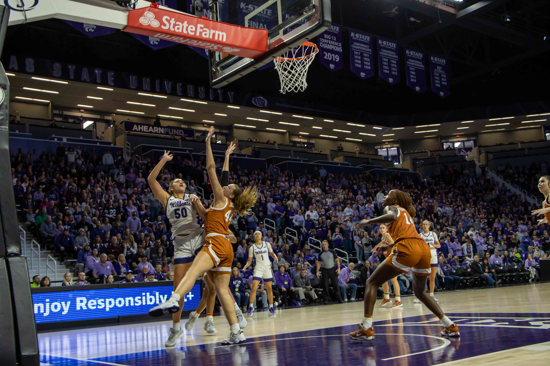 Center Ayoka Lee shoots the final K-State score of the Texas game. The shot iced the Longhorns 61-58 as Lee finished with 21 points.