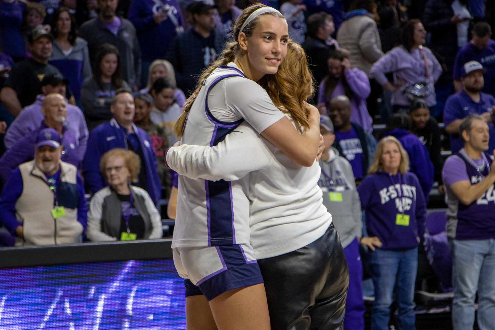Guard Serena Sundell hugs director of student development and branding Elisabeth Brown following K-State's 61-58 win over Texas Jan. 13, 2023. Sundell ended the the game with the second most points on the Wildcats with 12 while also recording six rebounds, five assists, one steal, one block, three turnovers and two fouls.