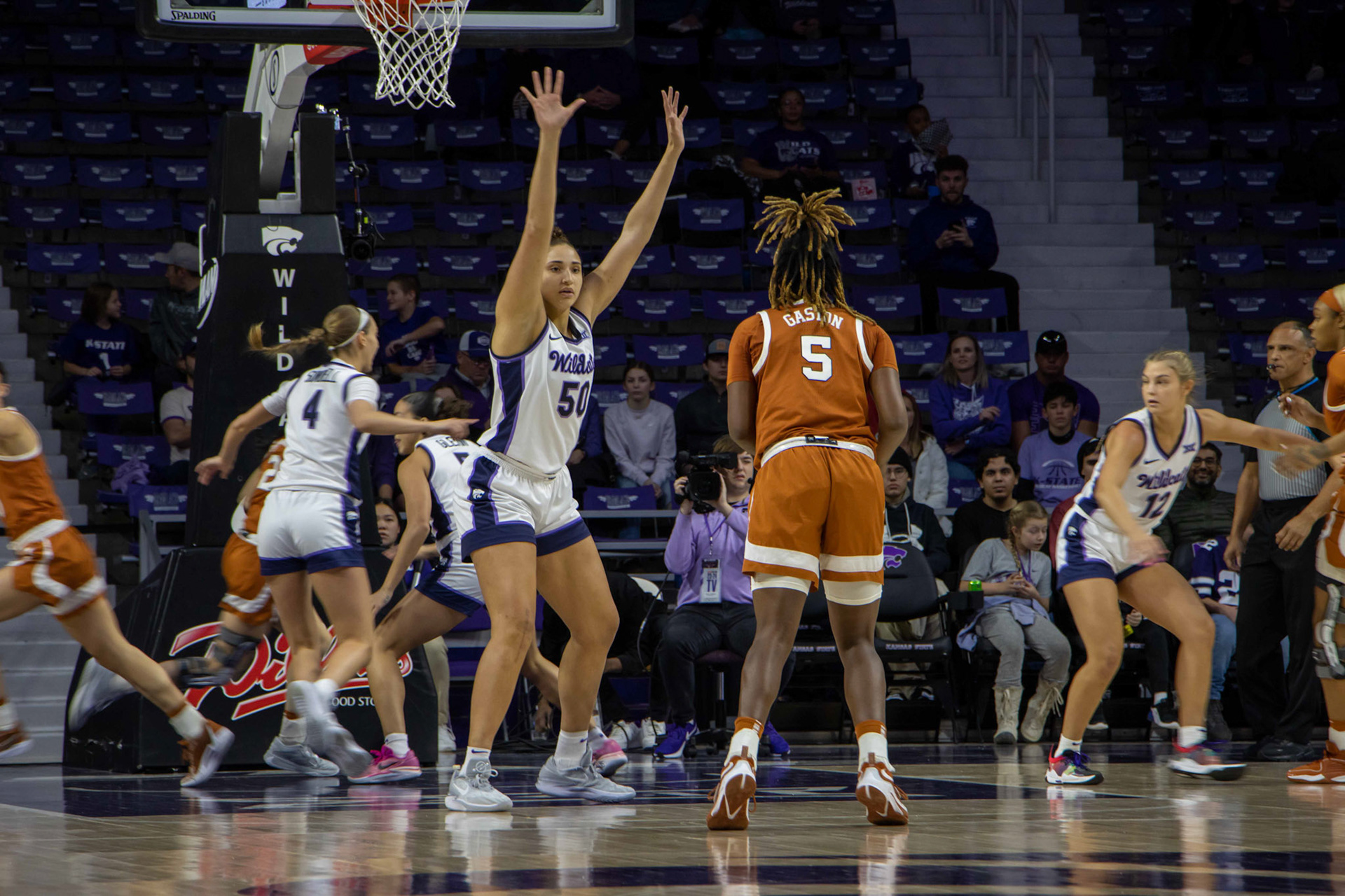 Center Ayoka Lee defends Texas forward DeYona Gaston at the beginning of the matchup. K-State started the match with a 7-0 run, the largest lead any team would hold.