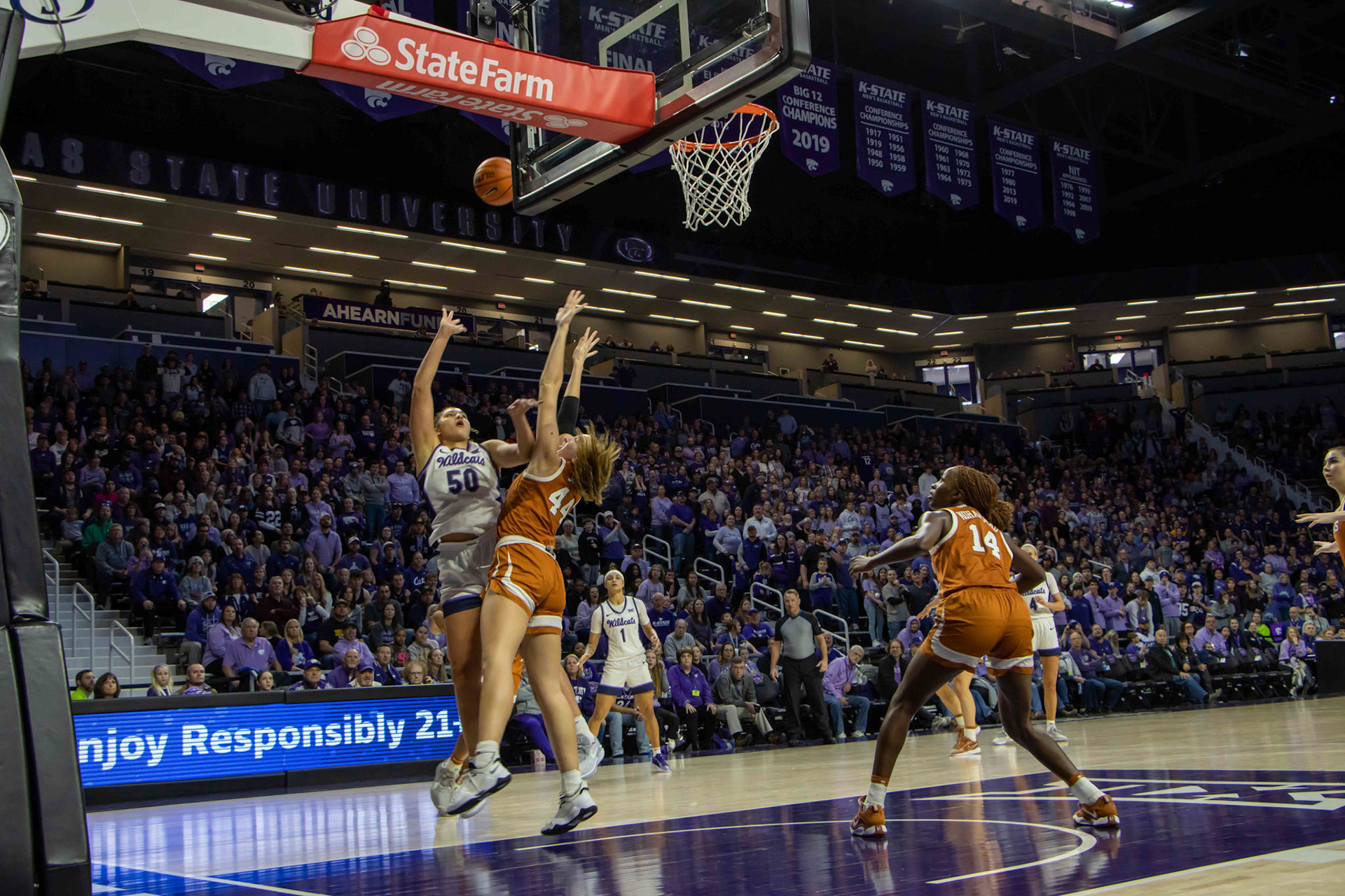 Center Ayoka Lee shoots the final K-State score of the Texas game. The shot iced the Longhorns 61-58 as Lee finished with 21 points.