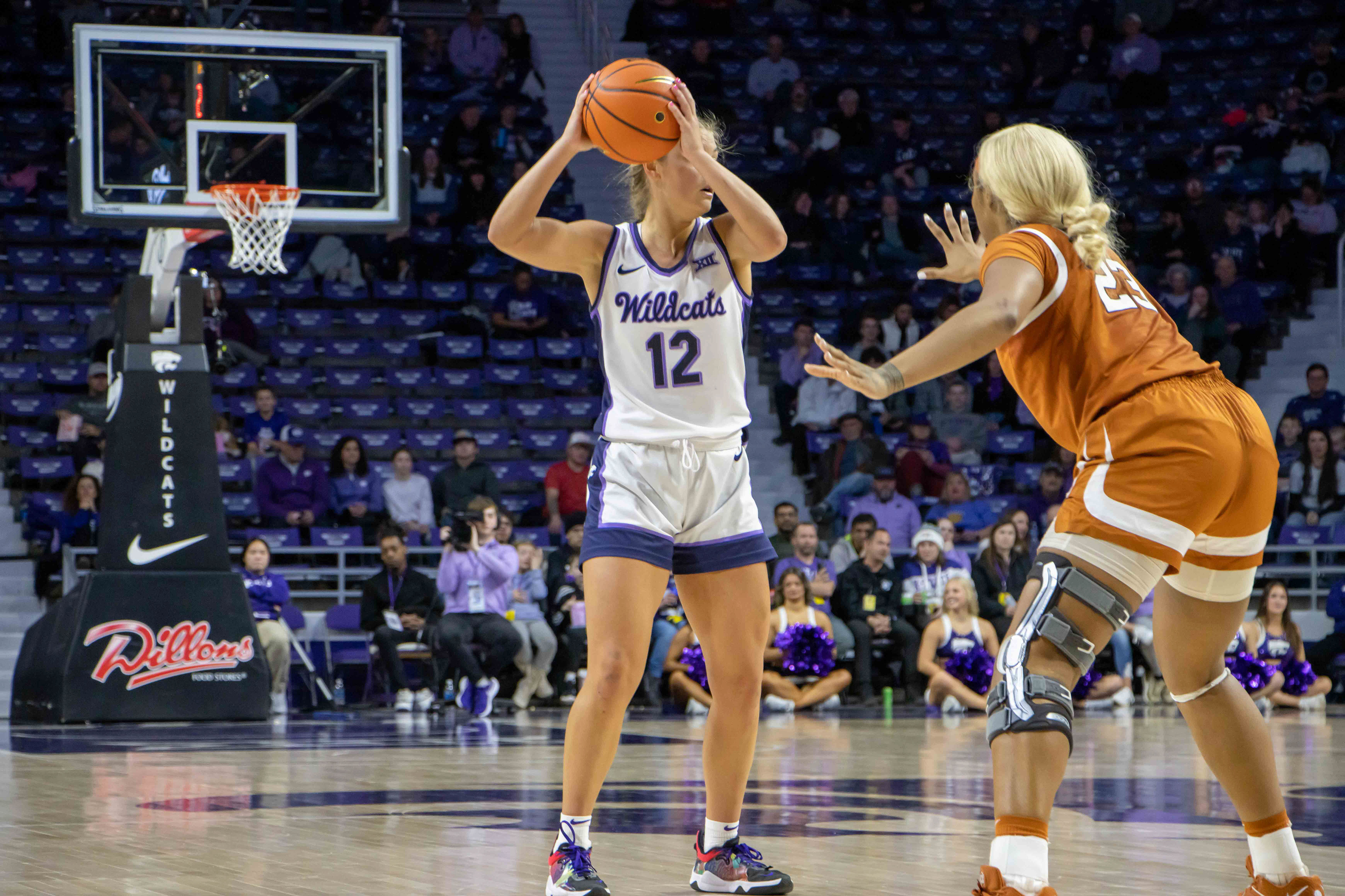 Guard Gabby Gregory looks for an opening in the second quarter against Texas. K-State would end the half down 31-30 to the Longhorns.