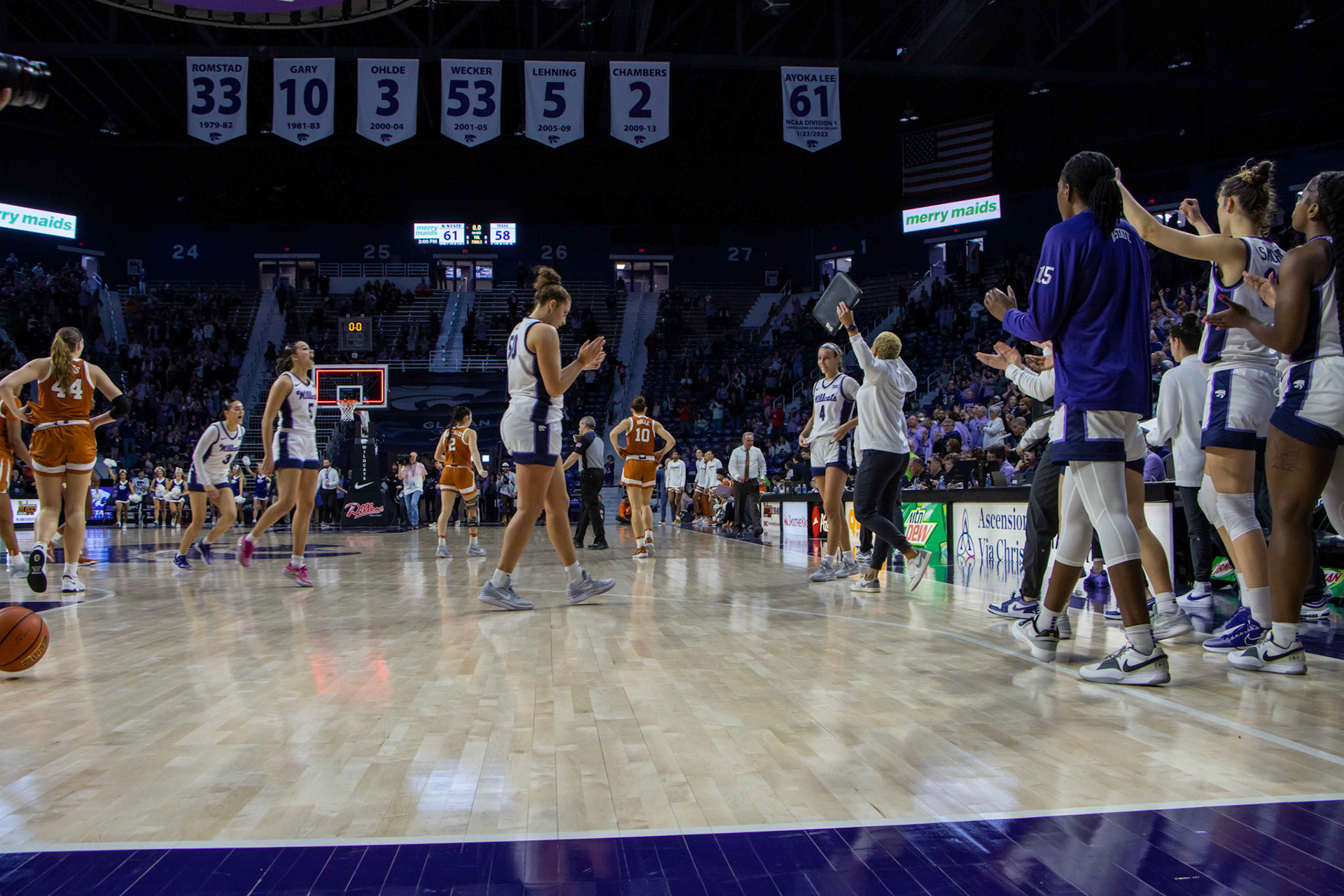 Center Ayoka Lee heads to the handshake line with her teammates after the clock hit zero, finalizing K-State's win over Texas. No. 12 K-State beat No. 10 Texas 61-58 Jan. 13, 2024.