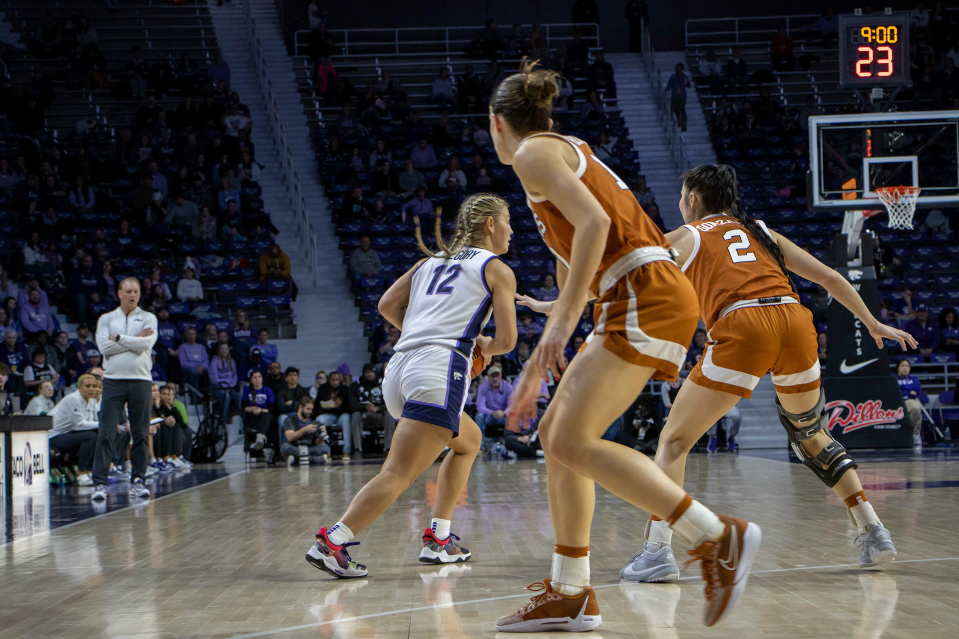 Guard Gabby Gregory passes above the 3-point line in the first minute of the second quarter against Texas. No. 12 K-State beat No. 10 Texas 61-58 Jan. 13, 2024.