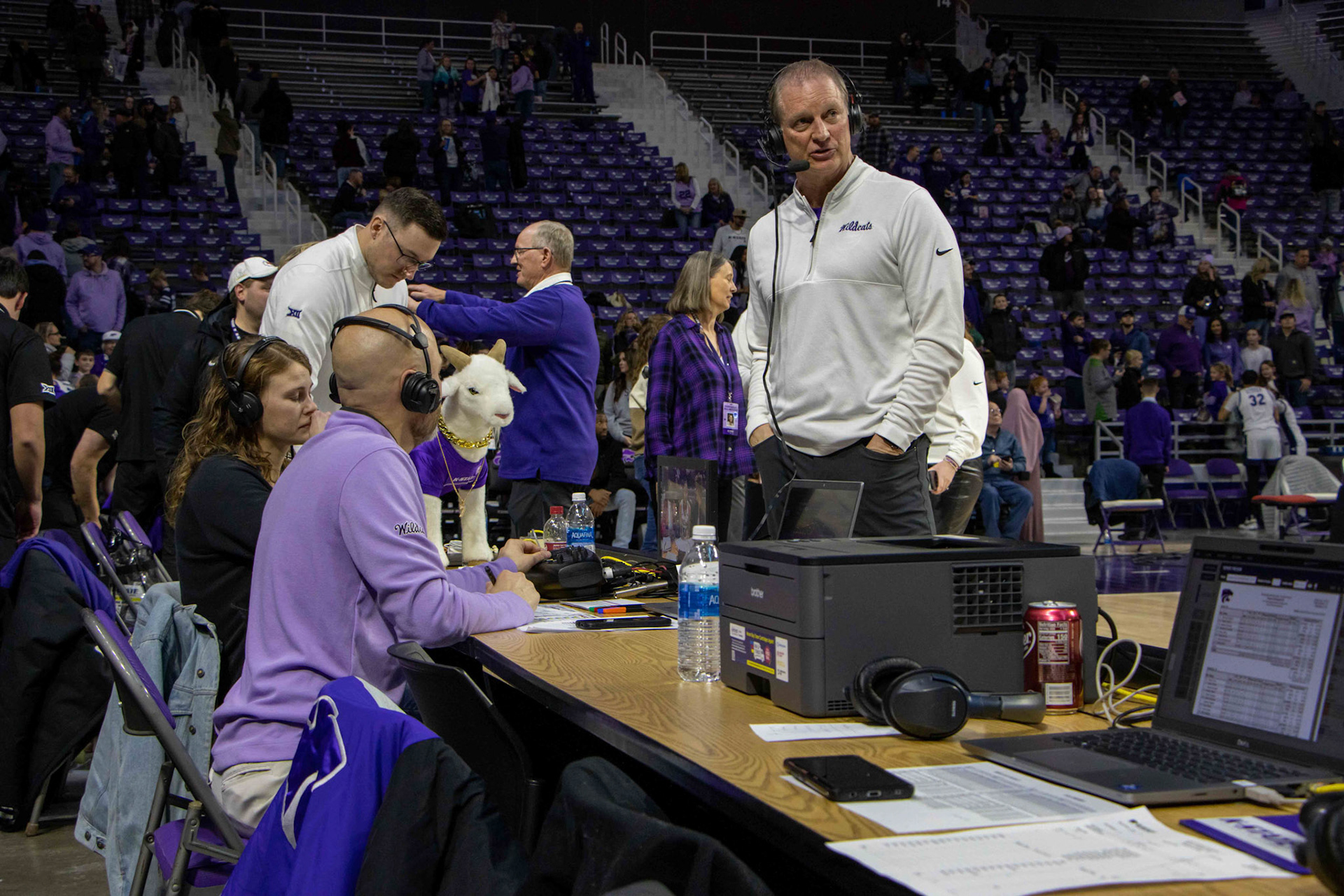 Head coach Jeff Mittie attends to a sideline interview with Gap Goat present after defeating Texas 61-58 Jan. 13, 2024. The Wildcats move to 17-1 on the season and remain undefeated in conference play with the win.