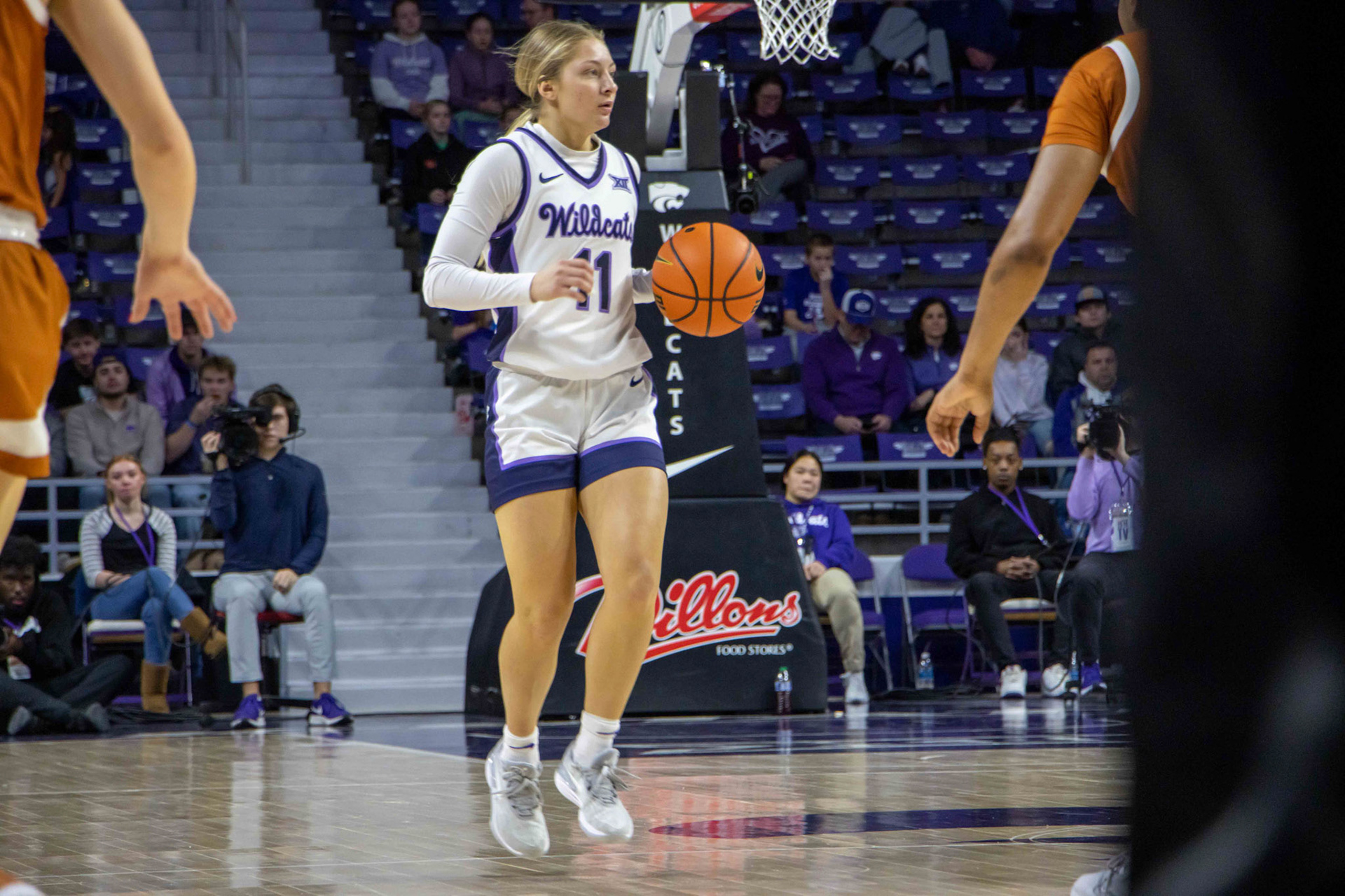 Guard Taryn Sides dribbles down the court in the Texas game on Jan. 13, 2024. Sides saw limited playing time as the Wildcats took down Texas 61-58.
