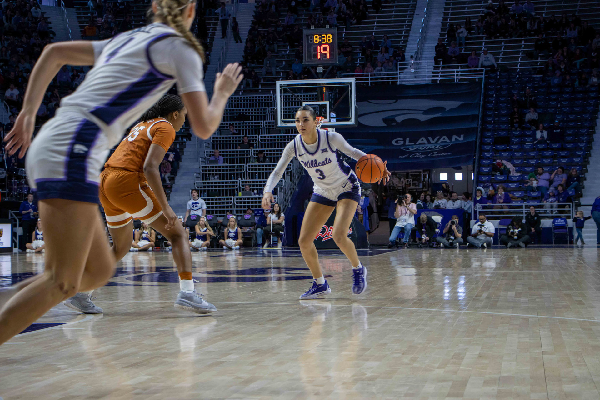 Guard Jaelyn Glenn looks for an opening at the beginning of the third quarter against Texas. Glenn quicking found an opening, resulting in her sister, guard Brylee Glenn to earn two points.
