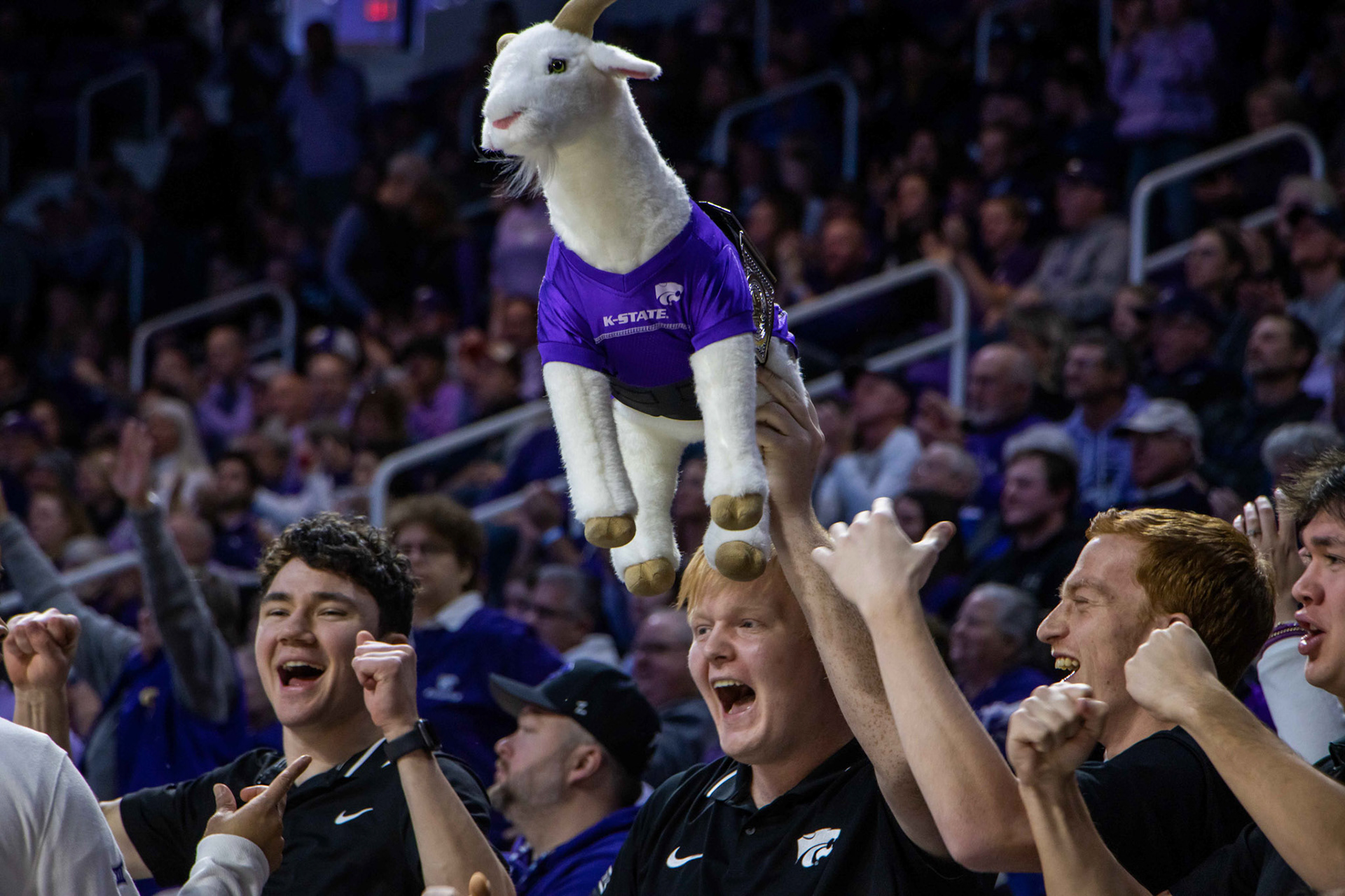 The women's basketball team managers hold up Gappy the Goat. Every time the women's basketball team gets three defensive stops, a team manager holds up Gappy in celebration.