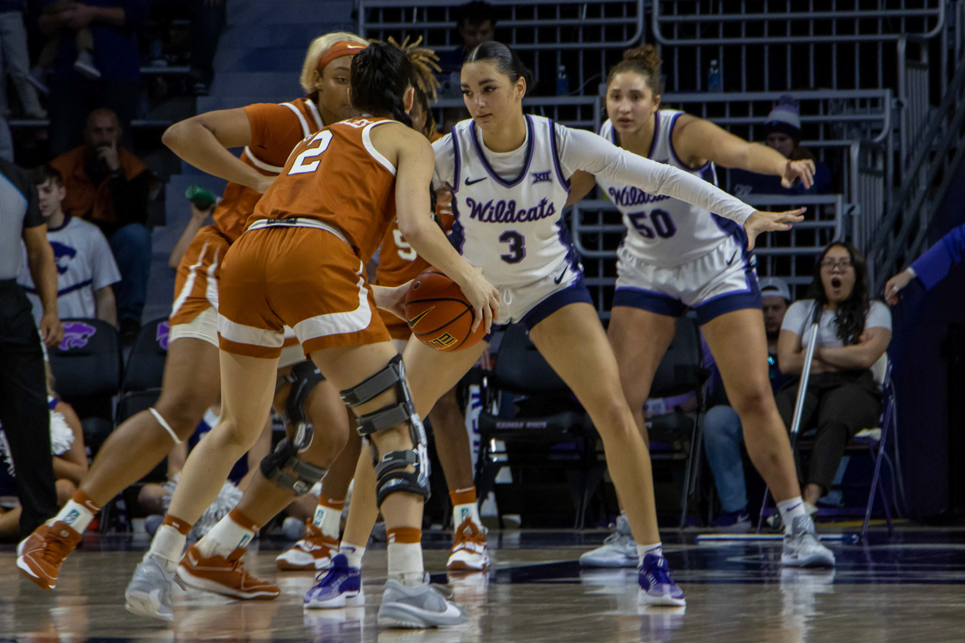 Guard Jaelyn Glenn defends against Texas guard Shaylee Gonzales in the fourth quarter. No. 12 K-State beat No. 10 Texas 61-58 Jan. 13, 2024.