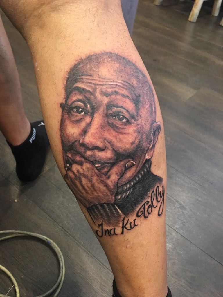 Tattoo on sons leg