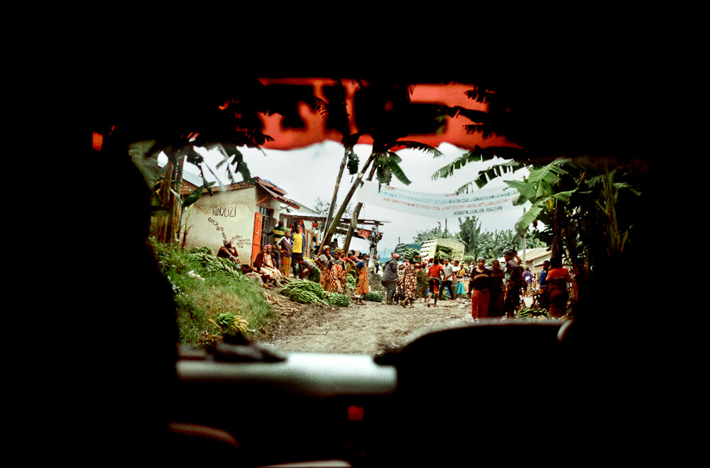 The windscreen view of our minibus as we approached the bustle of a local market
