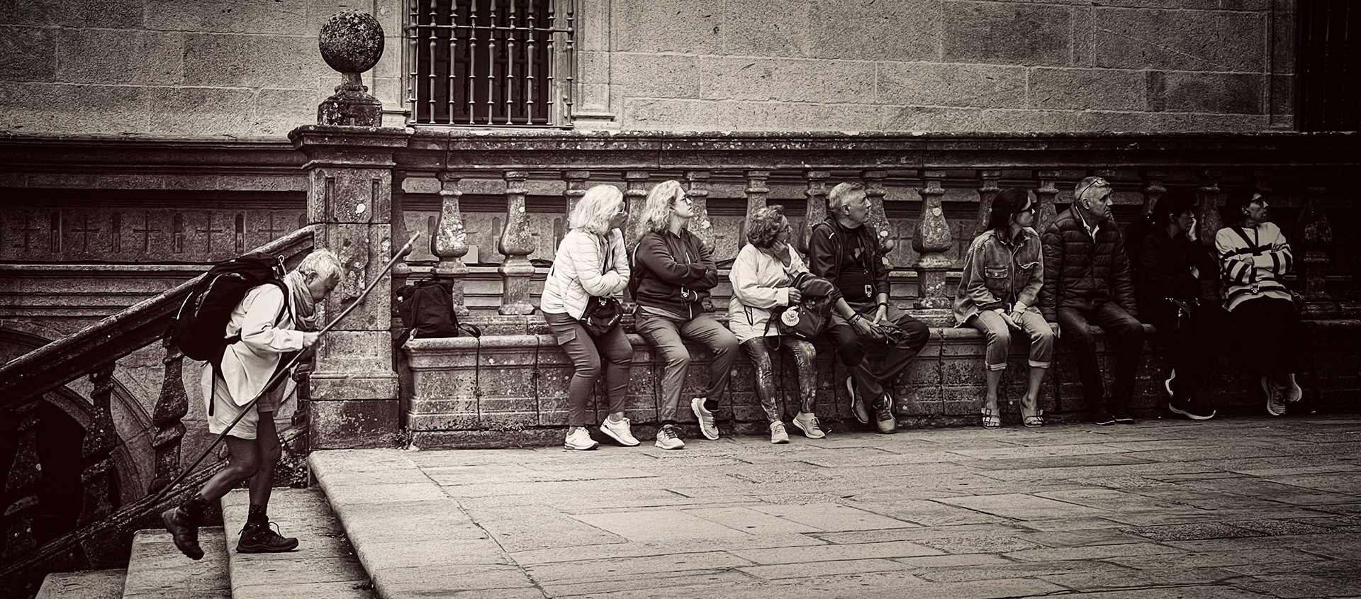 Pilgrim arriving in Santiago de Compostela