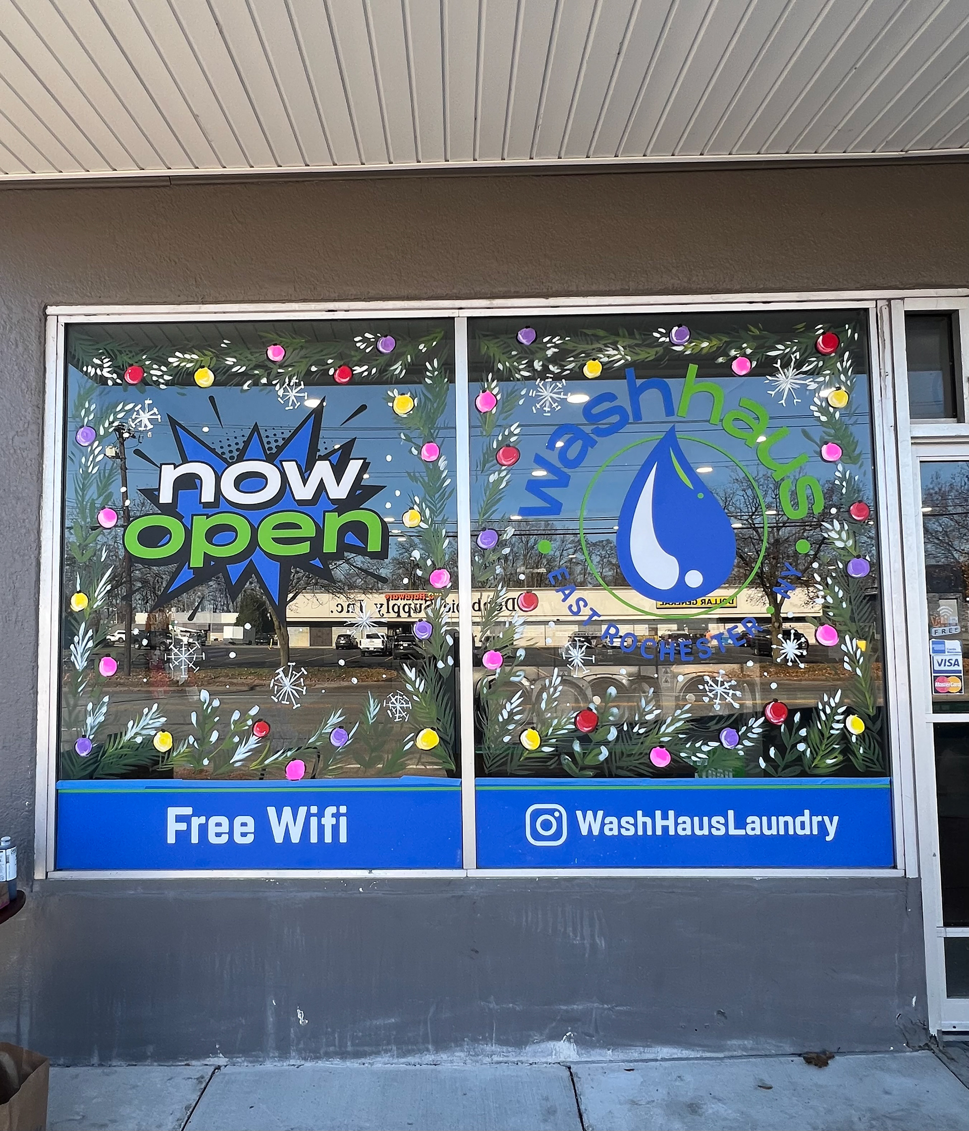 I collaborated with Wash Haus Laundry to create a festive garland around all of their storefront windows for the holidays