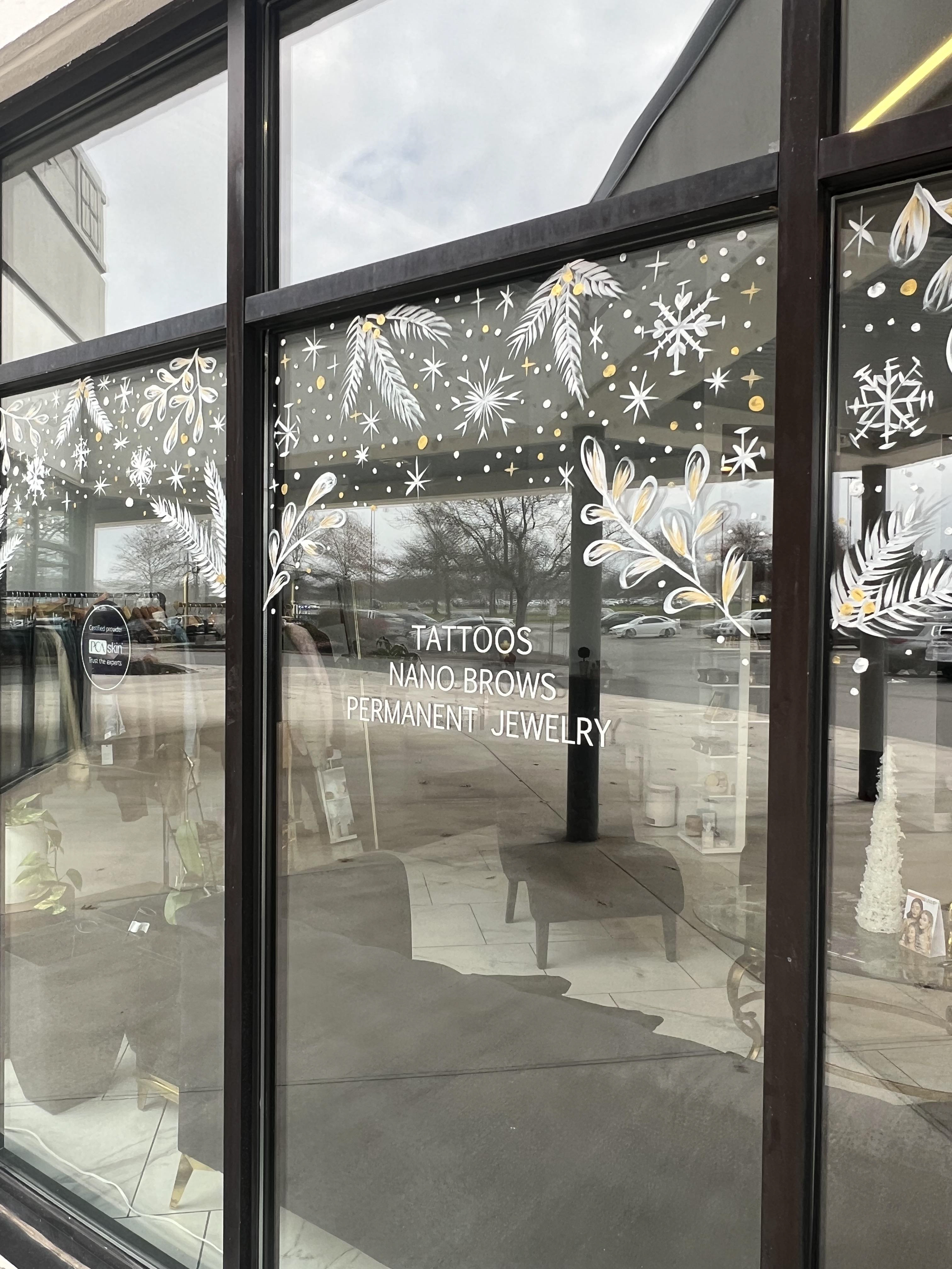 Winter themed designs were added to the tops of AE Salon and Spa for the Holidays