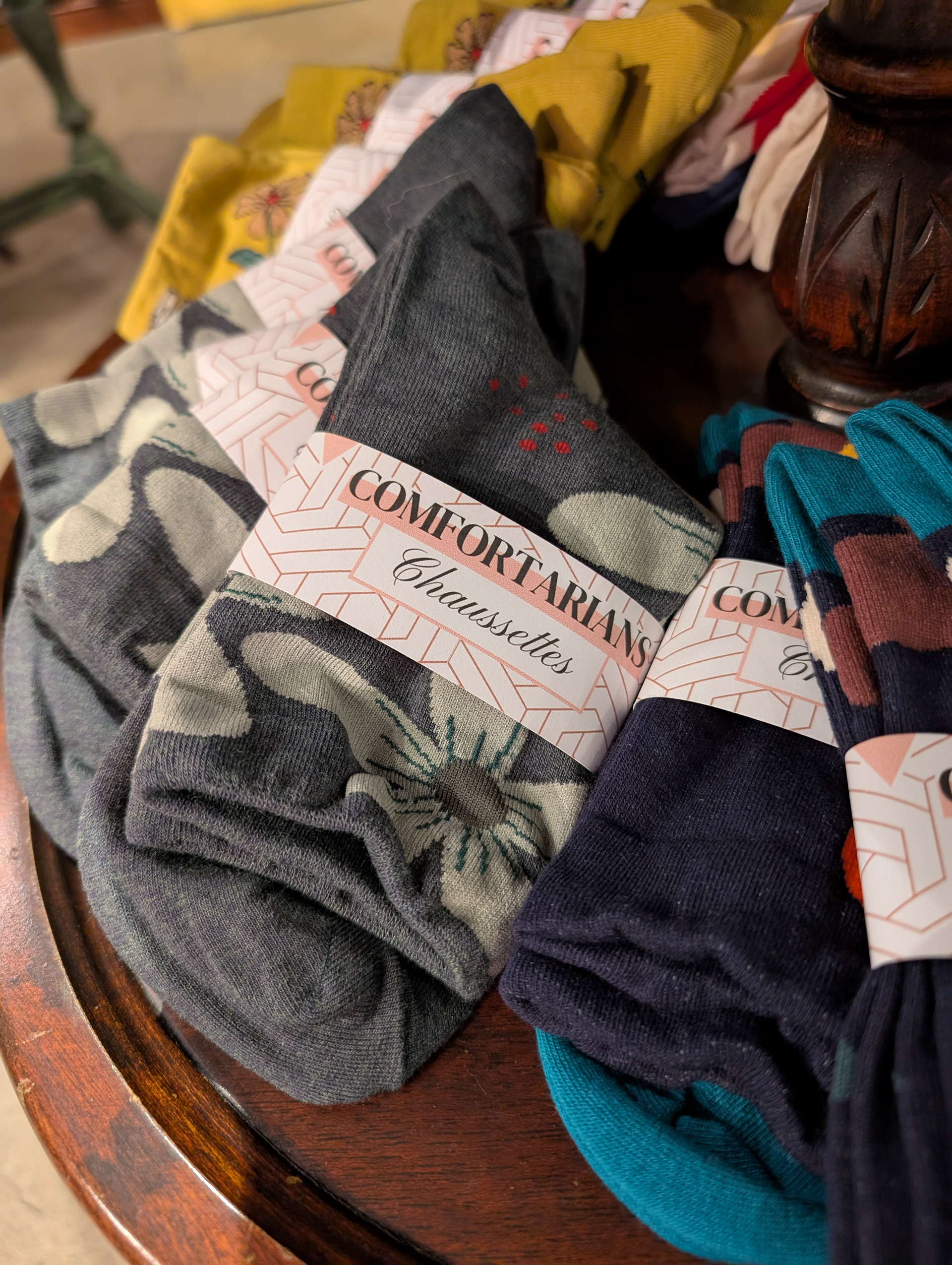 These socks arrived in generic plastic packaging that didn't reflect the color and playfullness of the socks themselves. Taking inspiration from the Comfortarians logo, I used pale pink geometric shapes to suggest a classy and modern vibe.