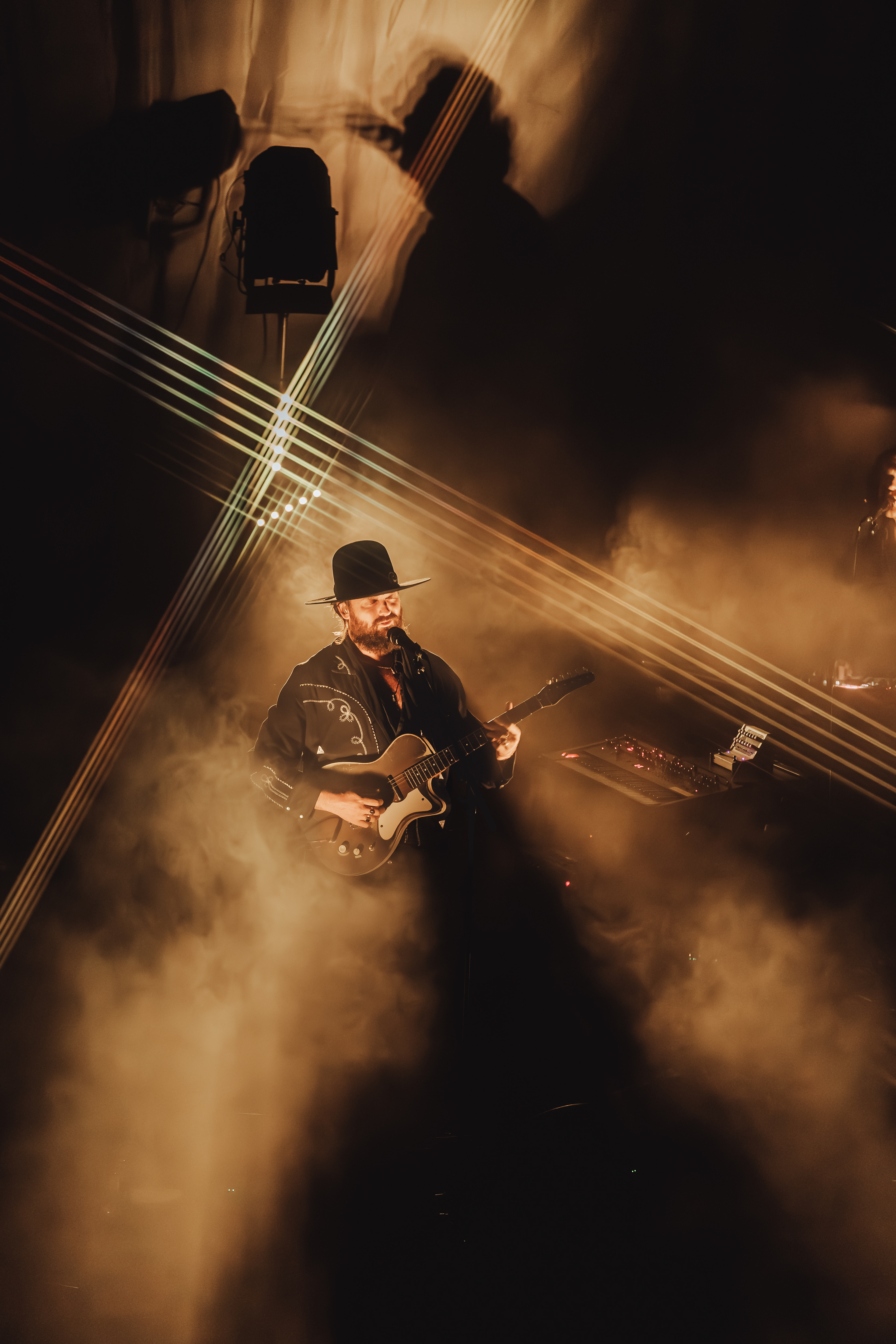 Dramatic stage lighting and crowd energy in this live music shot by Vitor Duarte, Sydney event photographer