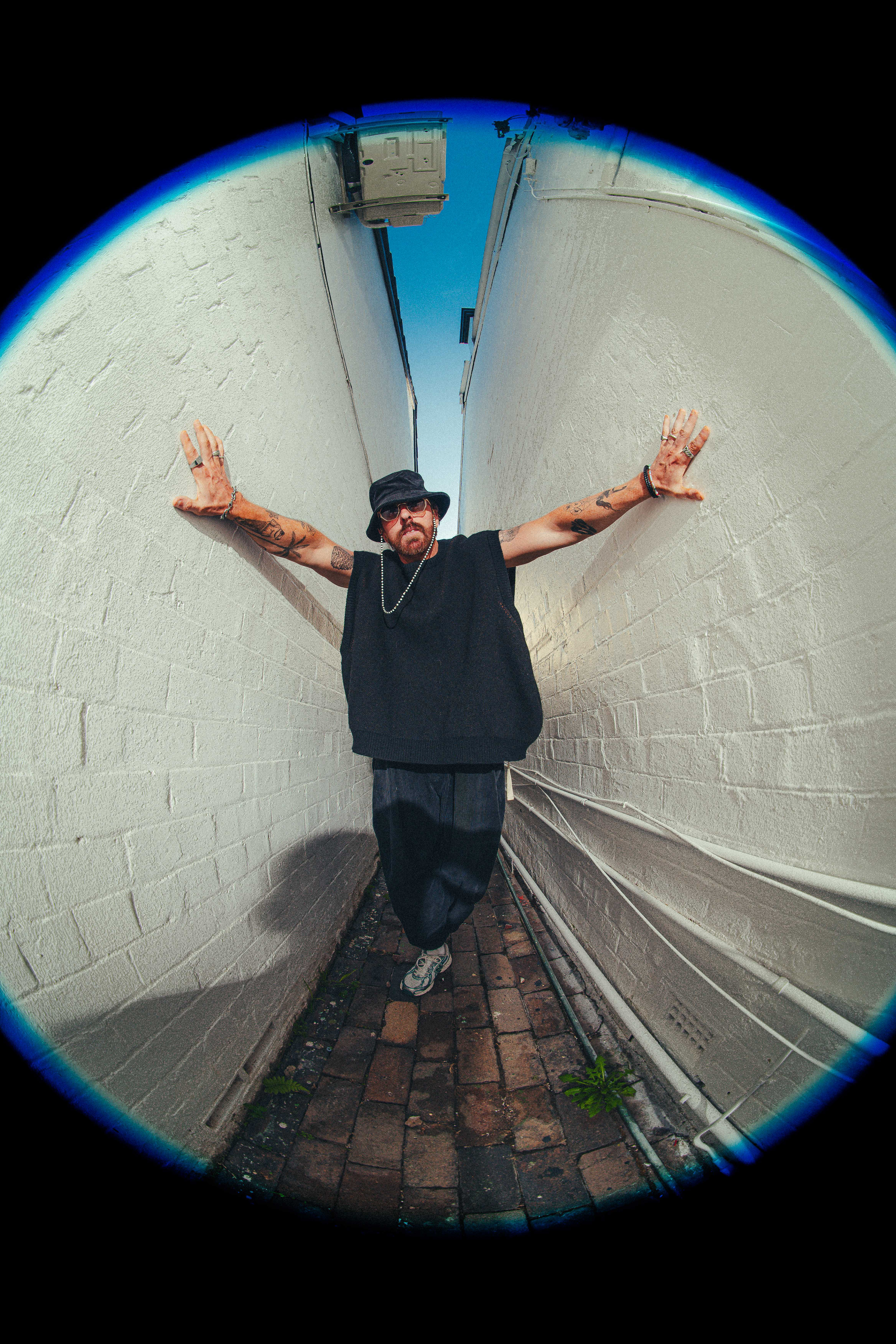 Editorial portrait of artist captured by Sydney-based fashion and branding photographer Vitor Duarte