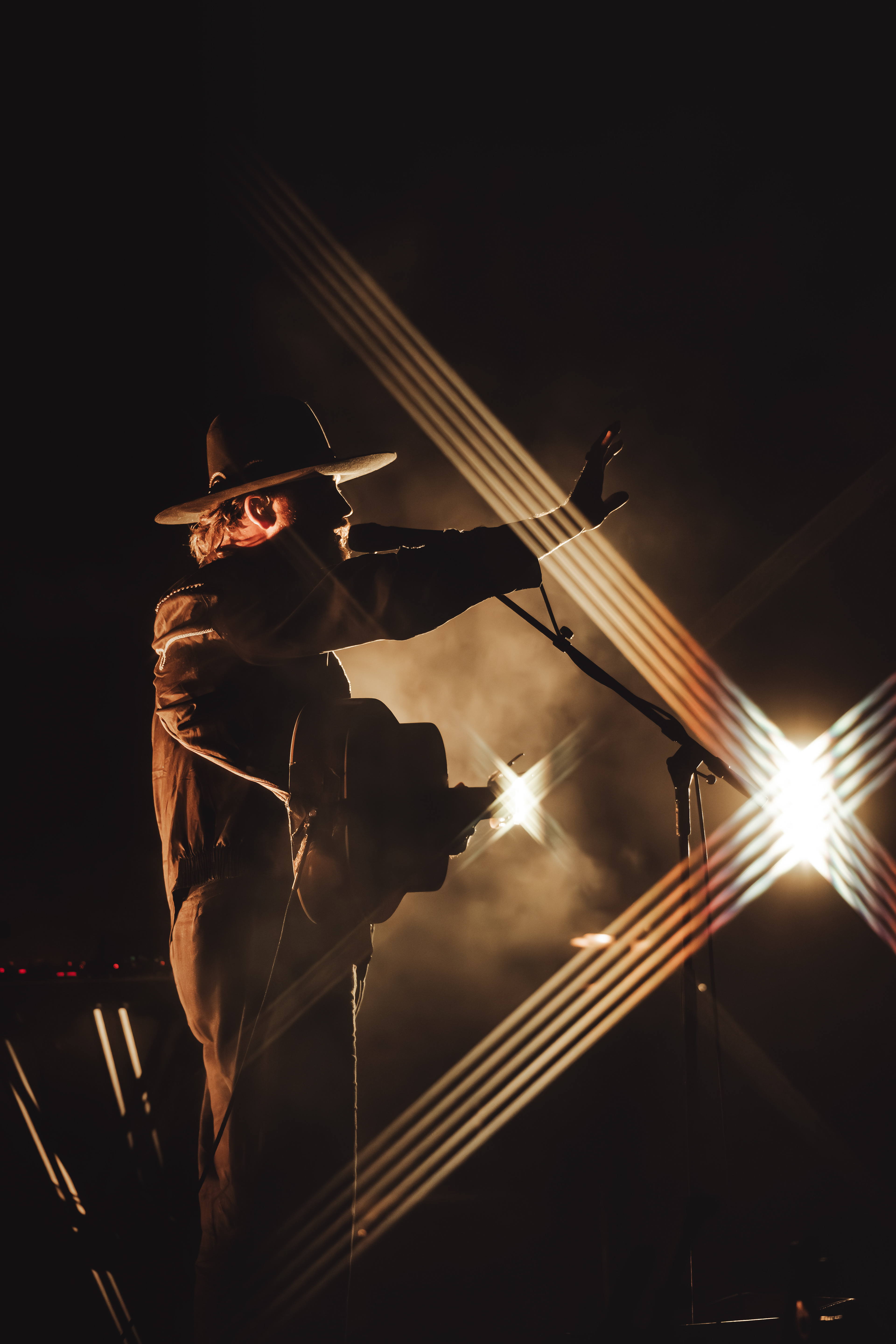 Editorial concert shot featuring strong backlight and silhouette by Sydney-based music photographer