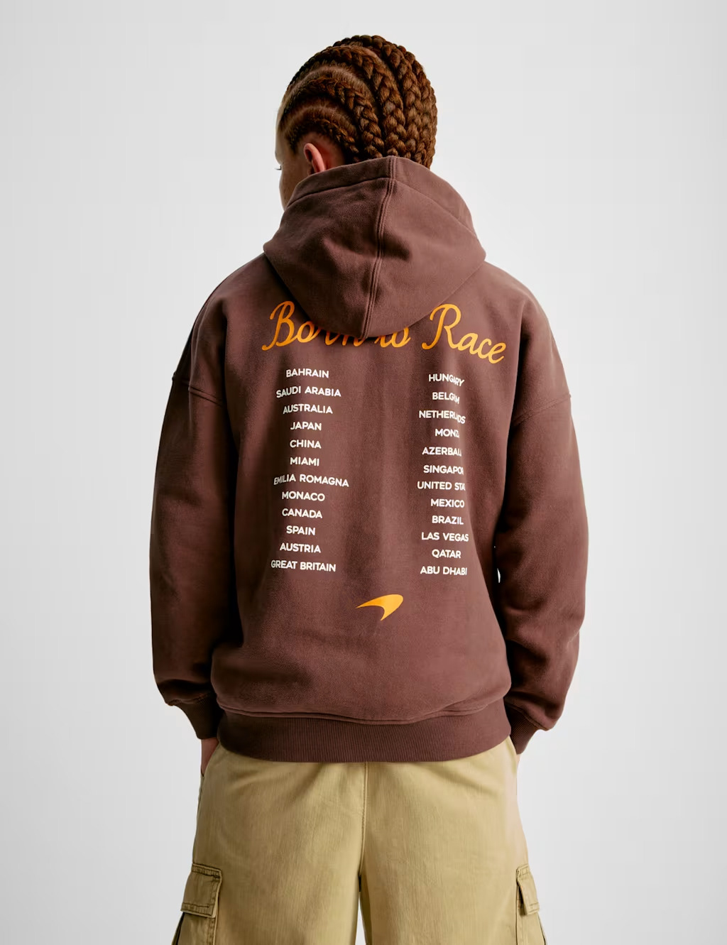 McLaren Formula 1 Racing Tours Kids Unisex Hoodie Rear View - Photography By Marks & Spencer