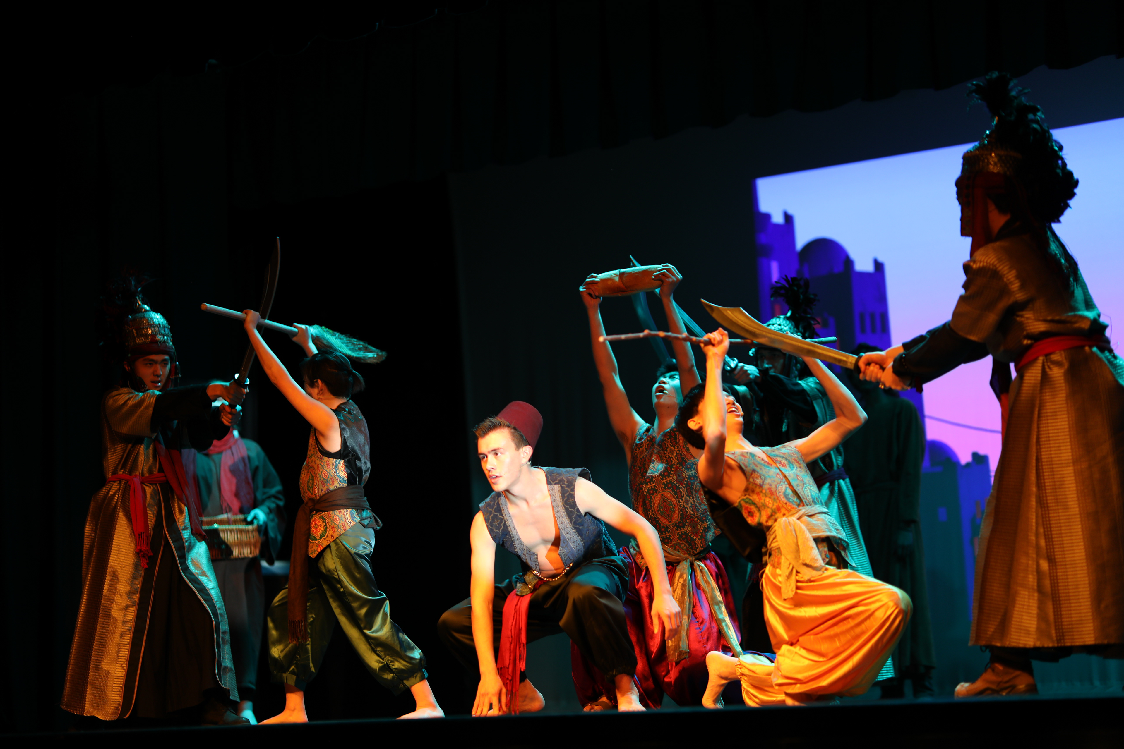 Aladdin's friends fend off the guards of Agrabah.