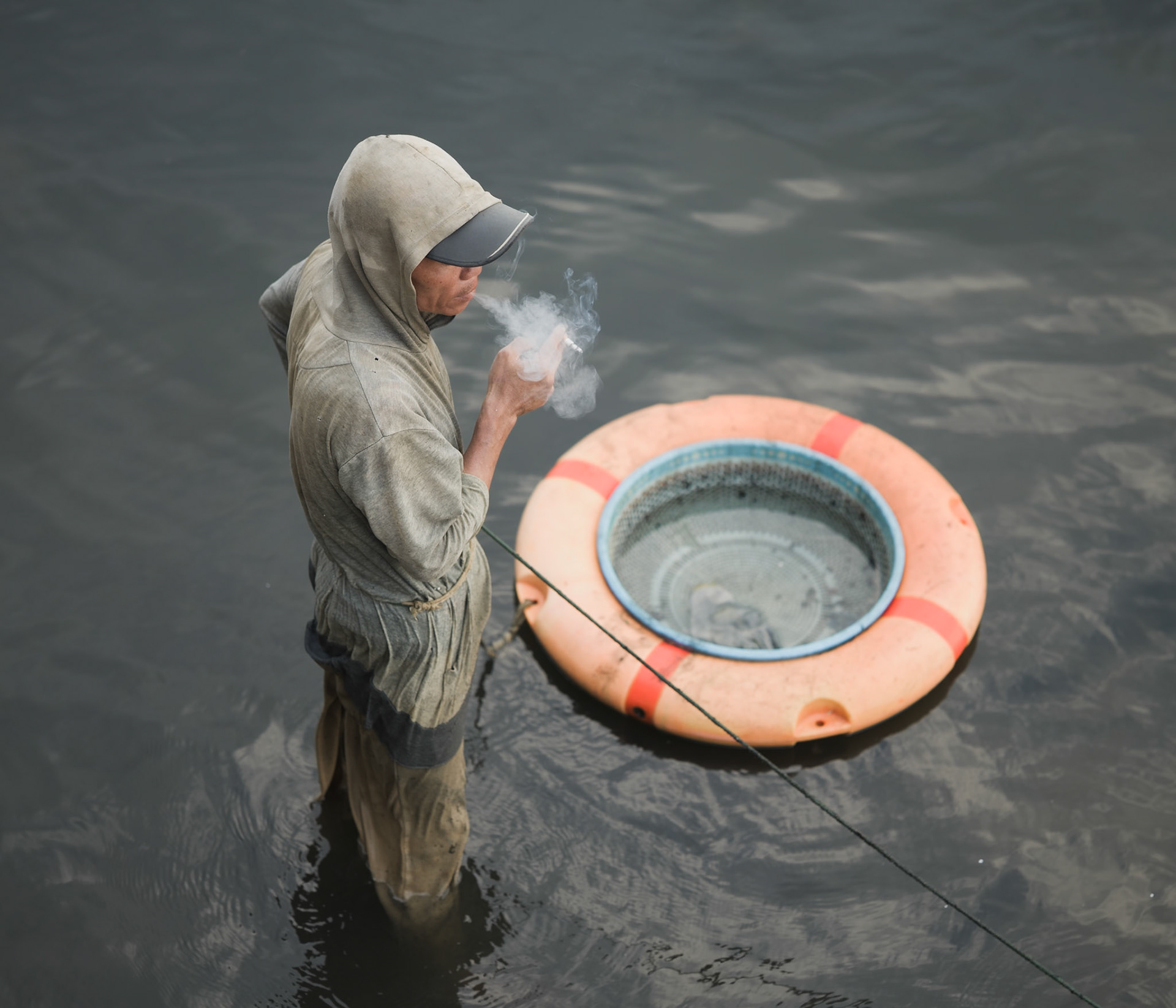 Fisherman in the River, Thuận Phước Bridge, Đà Nẵng, May 2026