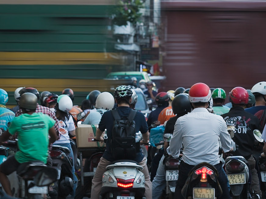 Scooters and Train rushhour Da Nang Sep 2025