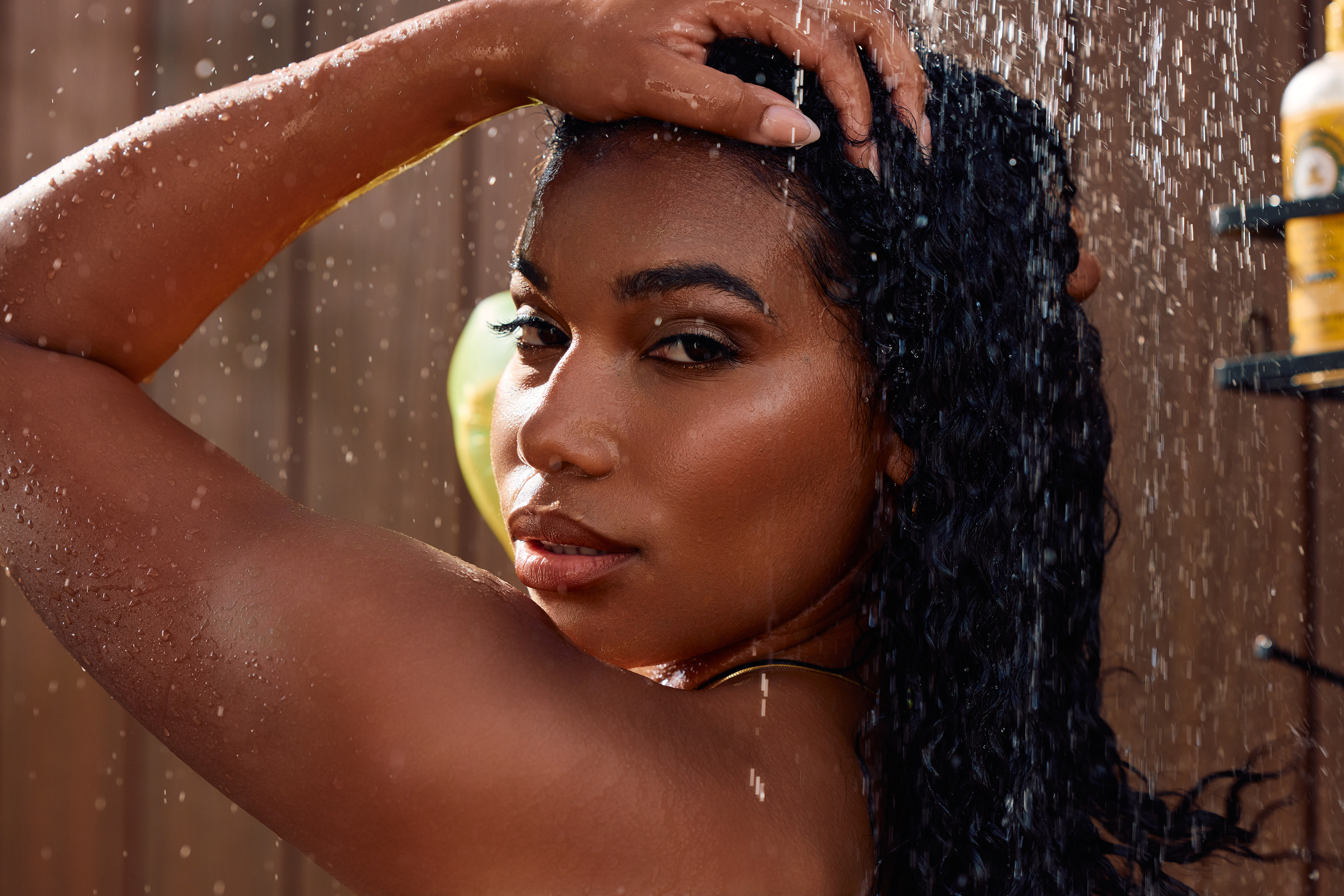 Commercial beauty photography featuring natural hair and shower lifestyle imagery for Blessed Bananas hair care campaign.