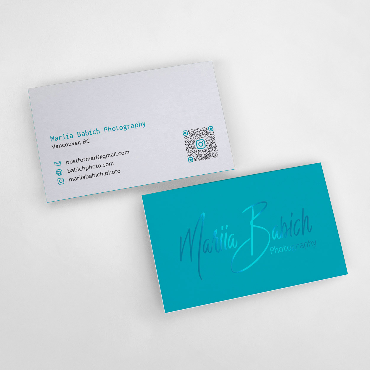 Double thick cards, with soft-touch lamination and teal foil in the back.
