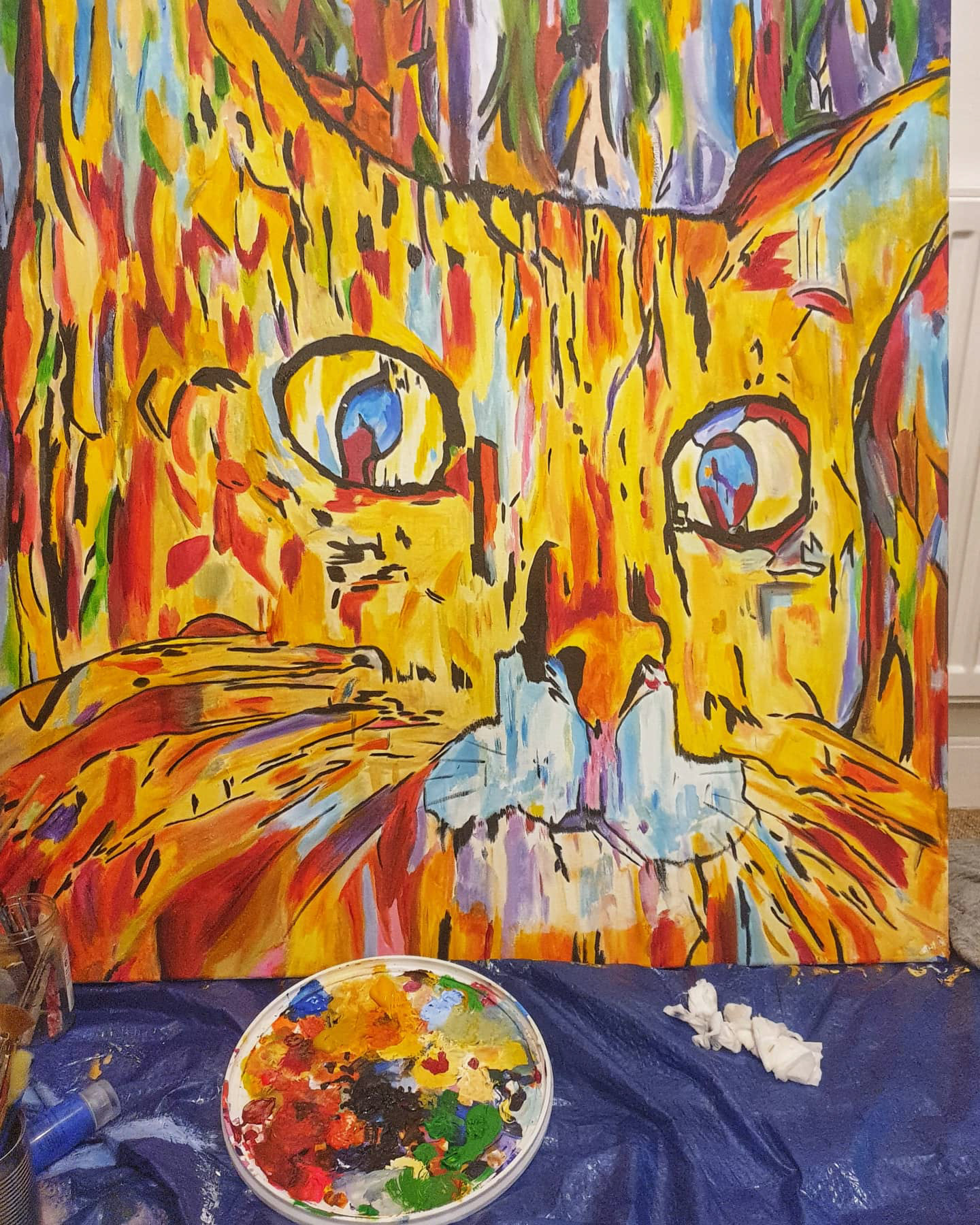 ’Gili T’’ Jemma Channing, acrylic on canvas, 2020 My work has always been focused on wellbeing and social change, hugely collaborative and based on working directly with people. When lockdown began in March my mental health took a nosedive and I found myself needing to practice what I preached. My usual processes of bringing people together was no longer viable, safe, possible or even legal. I continued to come up with ideas for future projects, but as my health deteriorated I realised I needed to do something purely for me. To practise what i preach when i talk about the transformative benefits of the arts. I spent lockdown painting giant rainbow cats. The antithesis of serious content, but it was something that was fun, silly and made me happy. It connected me with the memory of childhood - just painting for the sake of painting. No deep meaning, no serious message, nothing but fun. I painted a number of huge cats over lockdown (and continue to) the one i have shared here is called Gili T, after the island that i photographed this cat on, only a year earlier, when global pandemics were the stuff of sci fi movies and books. If nothing else I have learnt not to take life so seriously. it is wonderful to make serious, important, life changing art. But it's also important to do something just because it makes you smile. www.jemmachanning.co.uk instagram - @jemmachanning