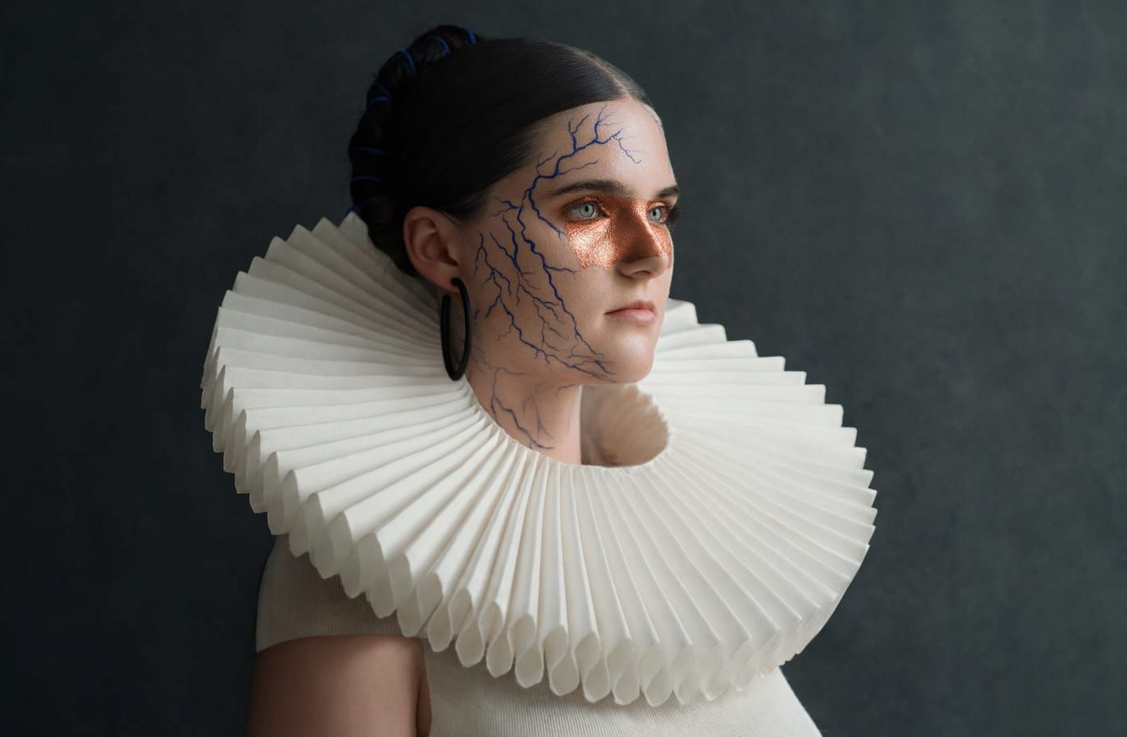 "The Sovereign Synthesis" Orock Evelyne Emede, 2026  "As part of my Sovereign Synthesis series, this work investigates the intersection of identity and contemporary editorial aesthetics. Through a deliberate synthesis of avant-garde makeup artistry and conceptual portraiture, I explore how personal and cultural narratives are constructed in the digital age. This piece serves as a visual bridge between traditional beauty standards and modern, experimental forms, reflecting my commitment to pushing the boundaries of high-fashion storytelling."