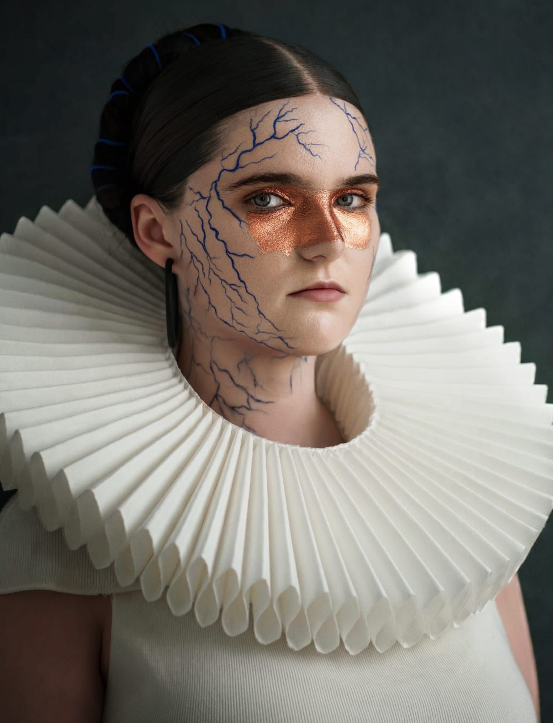 "The Sovereign Synthesis" Orock Evelyne Emede, 2026  "As part of my Sovereign Synthesis series, this work investigates the intersection of identity and contemporary editorial aesthetics. Through a deliberate synthesis of avant-garde makeup artistry and conceptual portraiture, I explore how personal and cultural narratives are constructed in the digital age. This piece serves as a visual bridge between traditional beauty standards and modern, experimental forms, reflecting my commitment to pushing the boundaries of high-fashion storytelling."