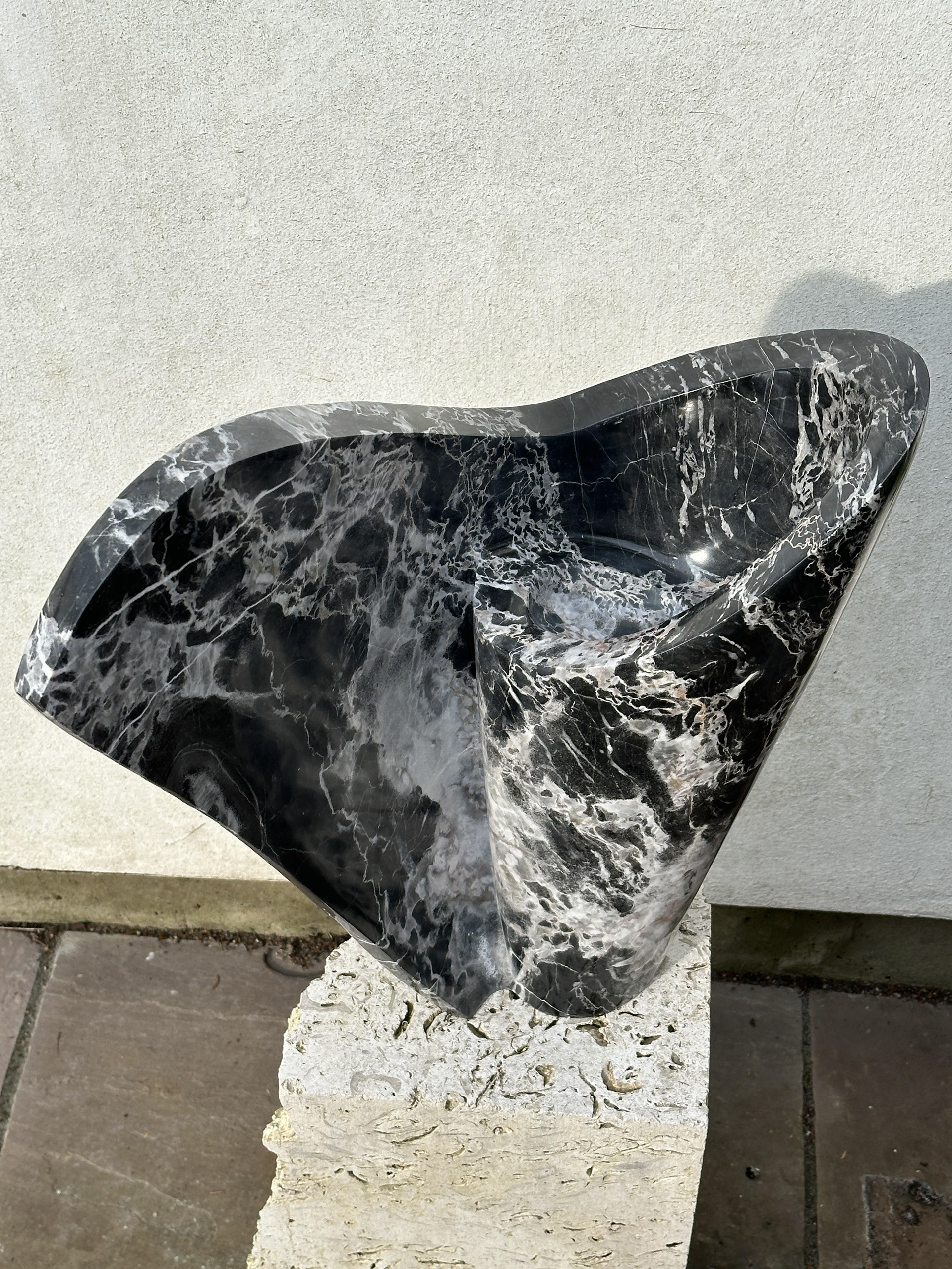 “The Unfurling Wing” David Ranby, sculpture, 2026 “The Unfurling Wing describes how the Nero Portoro marble wing is gradually opening. The aim was to give a sense of movement in the stone, with few flat surfaces. The hard edges of the outside of the wing aim to contrast with the curve of the main "body". Carved in 2026, in Pietrasanta, the marble is one of the rarest from the Carrara area. The 25kg carving was carefully pulled home in a suitcase by train, from Italy to Yorkshire.” @ranbydavid 