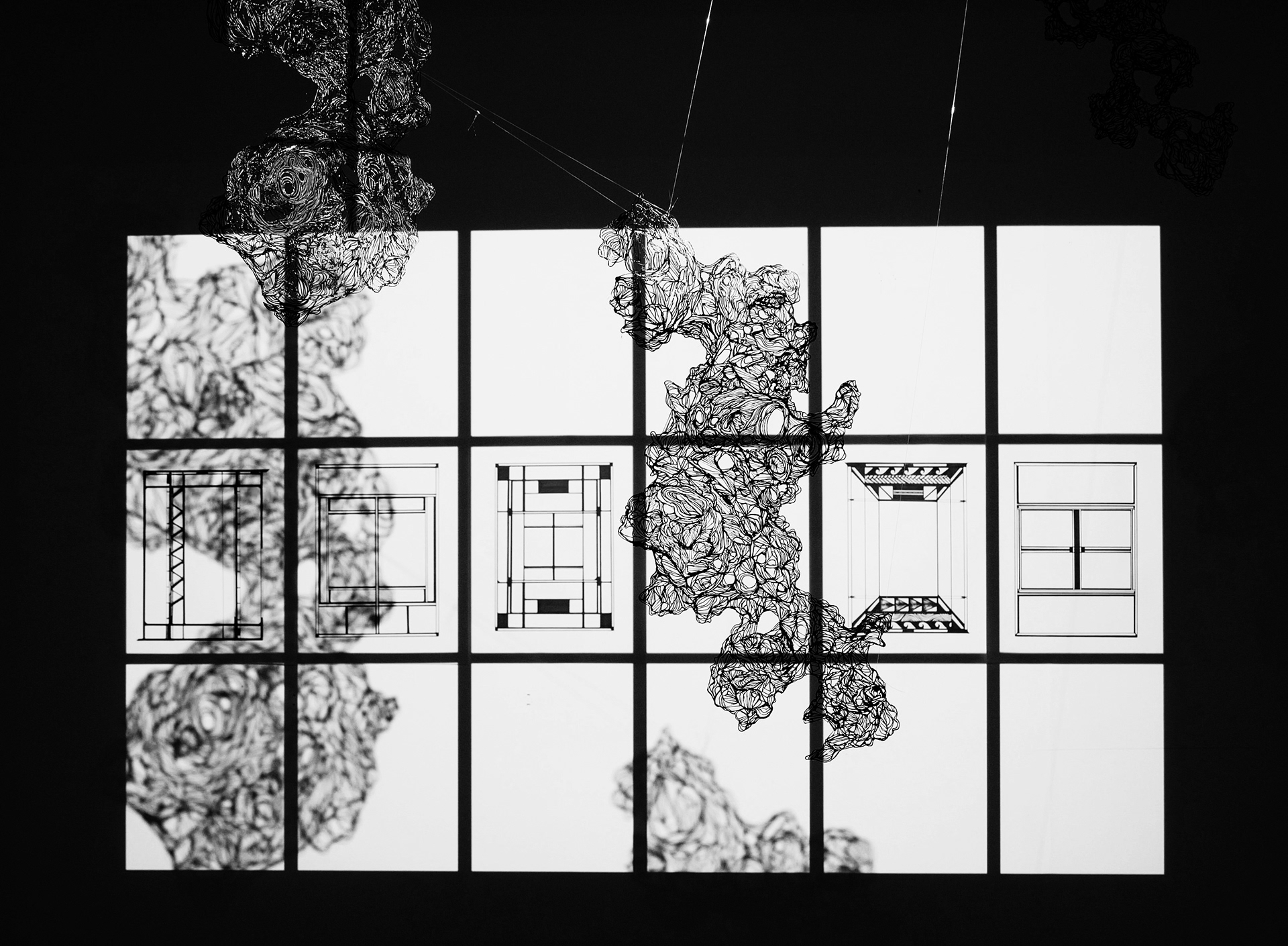 ‘’Window’’, Yula Kim, installation (set of projected installation and video) 2020 ‘’As a TCK, I have lived in different cities on 4 different continents-Asia, Polynesia, Africa, and Europe. The experiences which I have gained from different cultures created a new perspective of considering life matter, as well as the deal with life in the civilized area. Globalization is the utmost important movement, as it not only creates a new kind of cultural tolerance, but also it affects individuals, or the society’s development in numerous ways from the cultural diversity to the significant matter of seeing the world. I am one of the privileged ones due to such movement, however, such movement creates a new pressure in term of living due to the restless, and rapid spin of the life sequence -trend, job, academic matters, etc- in the city area. On the other hand, I found that natures are easily be ignored in human living places despite her important contribution to every living creature. Although, my life experiences from distinctive cities in the world have created similar feelings regardless of their cultural difference or the economic matters from the place. Hence, such experiences enabled me to create a new kind of artwork that could reflect the personal aspects of the civilization, as well as related the idea, or the context from the work to numerous viewers regardless of their cultural or ethnic matters. It is also interesting that nature and the environment are often being ignored in the city despite her importance and people acknowledge. The pure form of the natural environment can be found in very limited places in the city, and most of the city areas are covered with man-made objects with few natural elements for decorating humanmade objects. Such ideas are visually great but it also impacts on the dried aura within the city. I have spent most of my life in the city area and therefore, I often felt the significance of the city and nature. Window is one of the most common objects that form the building. It is significant due to her multiple functions from the air referment to creatine the aesthetical aura. One of the actual functions of the window is to see the outer view from the inside of the building. Therefore, it could manipulate the viewers’ gaze of seeing the outer object through her shapes, size, and color matter (of the glass). In my opinion, such ideas are interesting in seeing the object, and also somehow it is like the allegory of what John Berger has referred to about the gaze matter in terms of seeing objects; ‘‘where and when we see something (that) will affect what we see.’ From this perspective, the window is, perhaps, the excellent object that could manipulate viewers' gaze of seeing outside-the world-depends on their location and the scale of it. On the other hand, I found that it also affects people’s outer gaze of the building and the perception of the building. (e.g. squared-glassy buildings are often reminding the typical office building.). My life experience in London since 2016 has shown me numerous interesting and valuable things in my life. In my gaze, London-which is one of the busiest cities in the world- is the city with ample cultural heritages, jobs/works, academic knowledge, and people from all over the world. London has numerous charming factors. While windows from central London regions have inspired me as I was amused by similar but unique shapes of windows from different buildings. The other interesting thing is that windows are everywhere in London, and reflecting almost every single element on the street and opposite side through her large glasses. Moreover, despite the unique shapes of each frame, the infinite repetition of windows in London is somehow like the allegory of the fast sequence of the contemporary lifestyle of many citizens, which are inclined to be busy, restless, and mundane. Moreover, in my opinion, everyone has a unique sequence and repeated schedule to live regardless of their cultural, economic, or other backgrounds. This sequence is different depends on their job or social status; e.g. student from the University of London has a repeated lecture and tutorial each week apart from their break and Employer from Bank also has a certain life pattern which comes from their company/work. As a person who is currently living in one of the largest cities in the world, I have felt my life in the city is quite dried and scheduled with numerous fixed schedules such as attend a student service at 18.00 at St. Helens and Wednesday’s PAL session from 13.00-14.00. Therefore, I decided to use windows to represent restlessly and repetition of the city life and to describe the dried and controlled aura within the city. The primary sources for this artwork are photos that I have taken from 2016 to 2019-London, Edinburgh, Brussel, Paris, Seoul, Roma, Florence, Vatican, and Kailua Kona (a sub-urban area in Hawaii). These photos are mainly windows from buildings in the central city regions and some sub-urban regions in different countries over the world. The secondary sources are the artists' researches, either artworks from large galleries-e.g. Tate Moderns, or books and their websites. I was mainly looking for artists who have used interesting styles to demonstrate his/her creative abilities and also was looking for artists who have used items related to windows, or square-shaped forms. I was inspired by Mondrian’s ‘Composition C (No.III) with Red, Yellow, and Blue’ (1935) since this artwork shows some sort of abstractive aesthetics. Moreover, I was looking for the artist Richard Woods paintings of doors -‘Door (2008)’ and I Never Felt So Much Alike Alike Alike (2019)’. Although, together with the aura from vivid colours, clear outlines of the doors in his artworks have emphasised the strong, and unique characteristics of each door. Such factors created an absolute new aspect of seeing the object door and has created a unique aura within the series. Also, I have made a study of video art, mainly related to sound and art. The artwork ‘The Great Animal Orchestra’ from Strand 180 has impacted my practice as I was inspired by the presentation style; the combination of the sound of the animal species with the DB graph from the recorded sound and small ponds. The large projected graph has created an overwhelmed aura within the artwork as well.’’ @robinykim (Instagram ID)