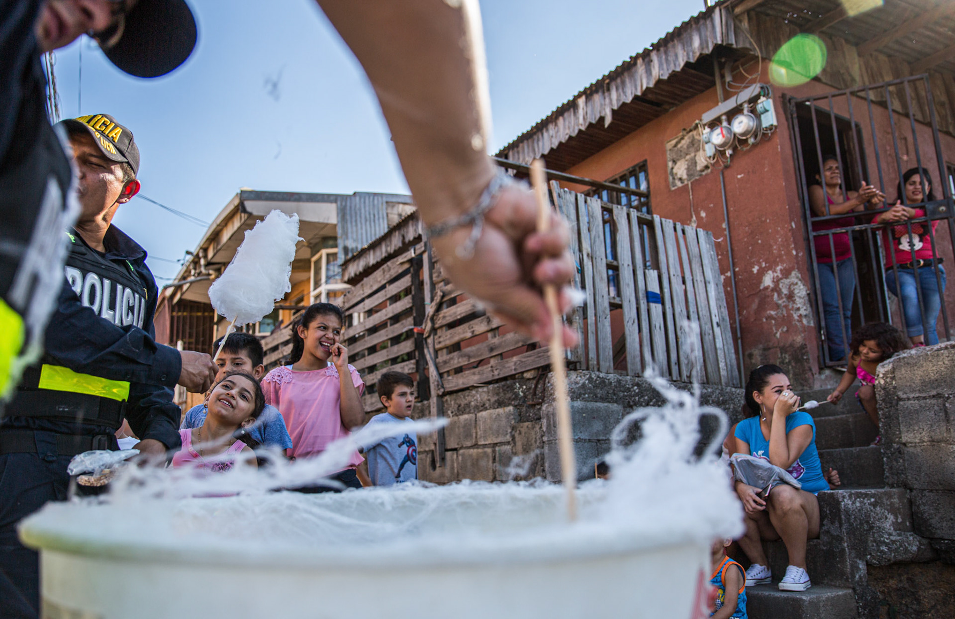 Costa Rican police conduct outreach programs in high-crime neighborhoods.