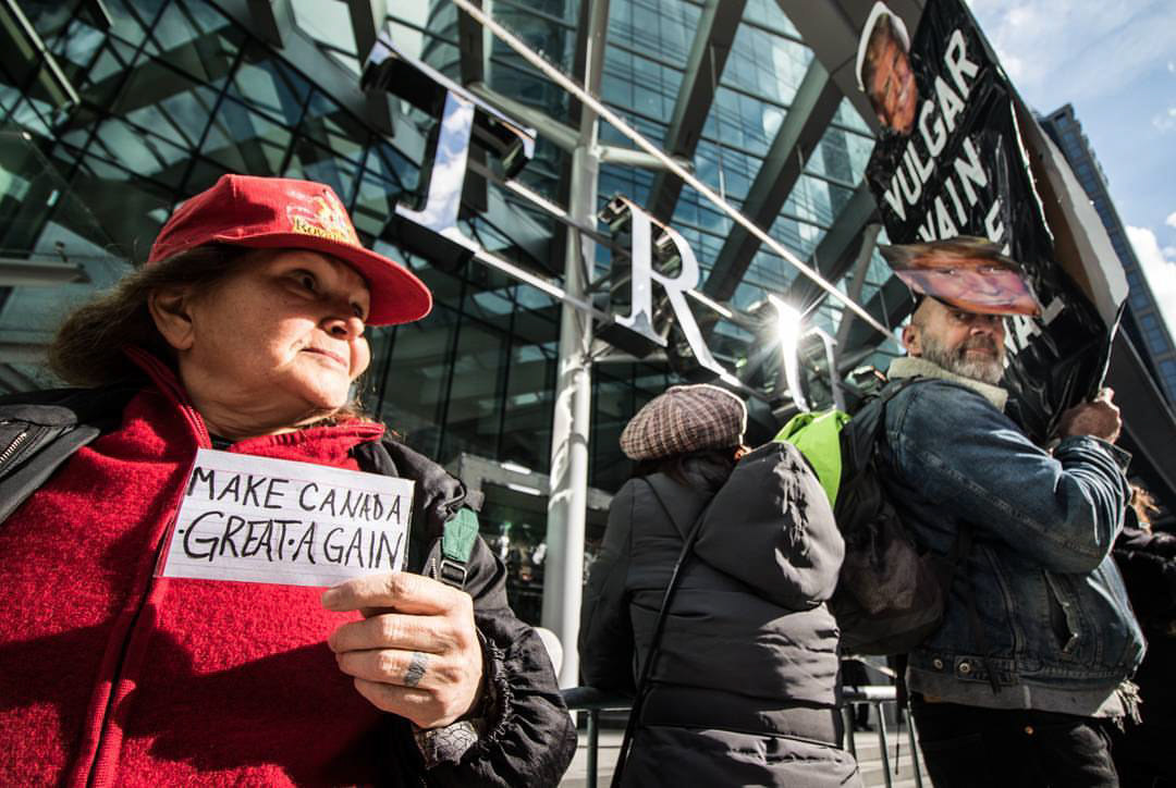 Anti-Trump protesters and Trump supporters at the Trump Tower opening in Vancouver, Canada.