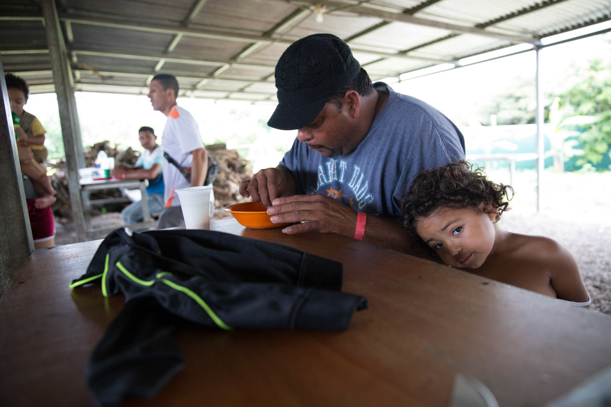 Lesly Antonio Mayorga and his youngest daughter at a refuge camp in Costa Rica after fleeing Nicaragua.