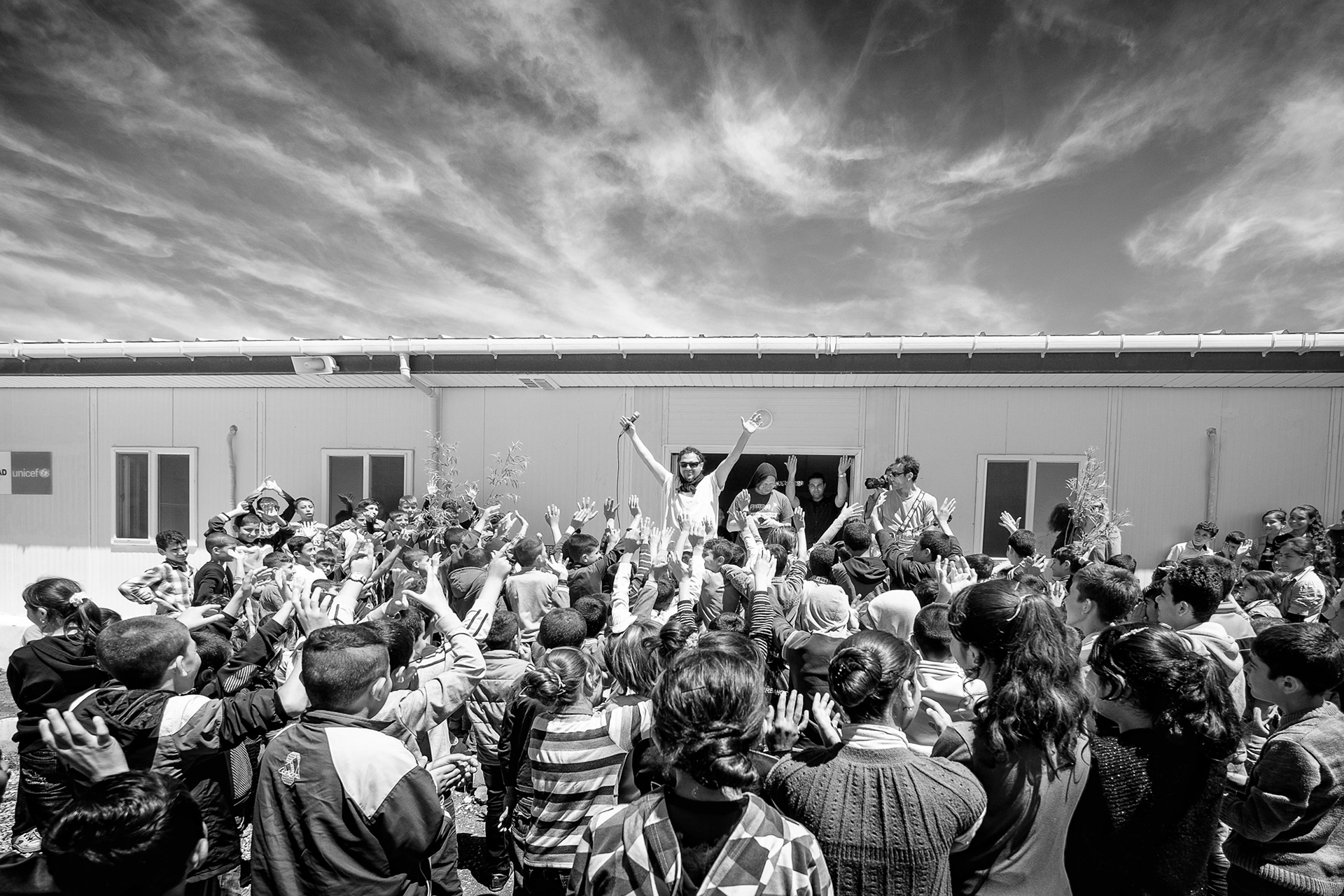 Sultan Tunc, a Turkish born German hip hop singer is entertaining the refugee kids in Nusaybin Refugee camp.