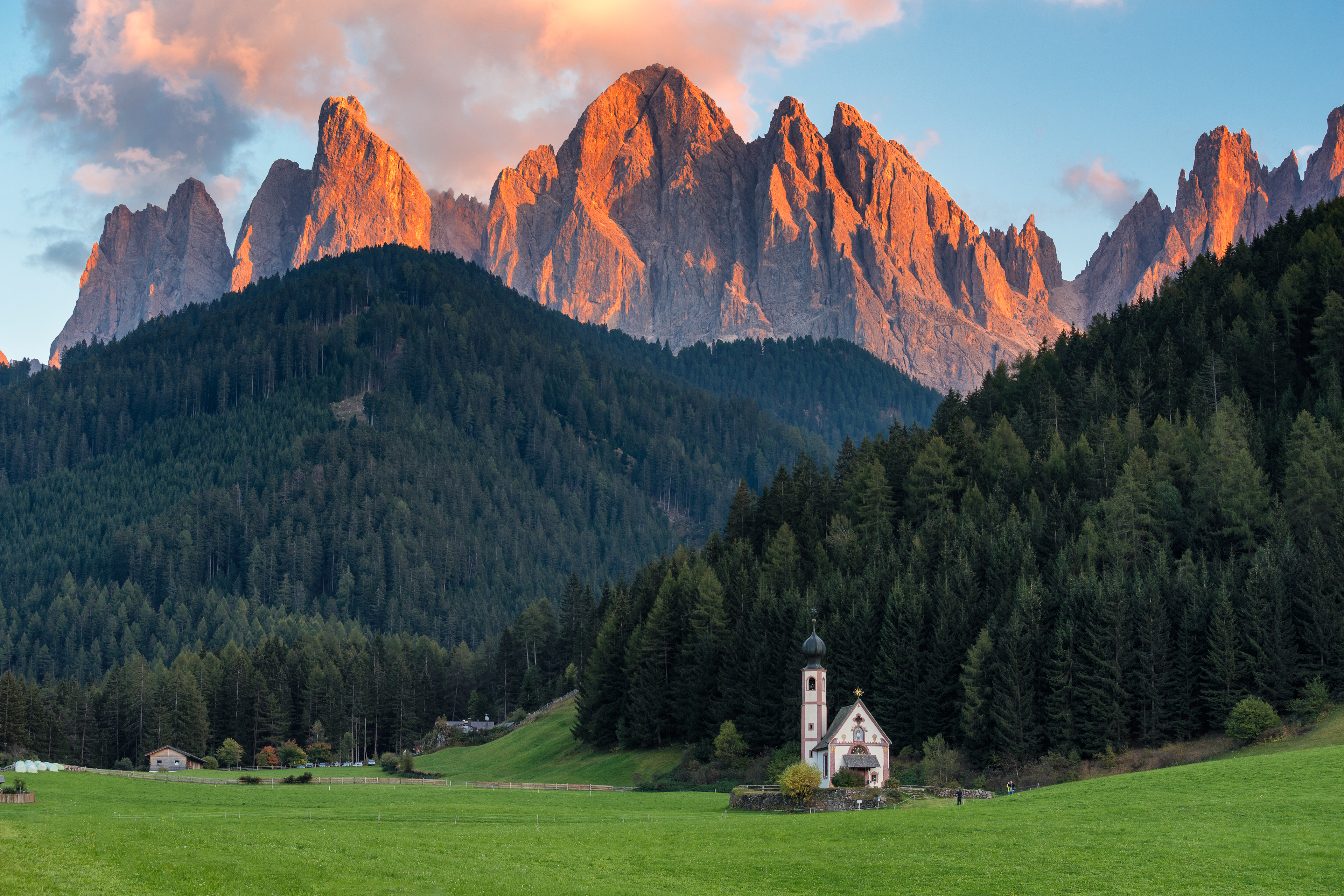 The lonely Church of St. Johann (San Giovanni) in Val di Funes, resting beneath the jagged peaks of the Odle/Geisler mountain group