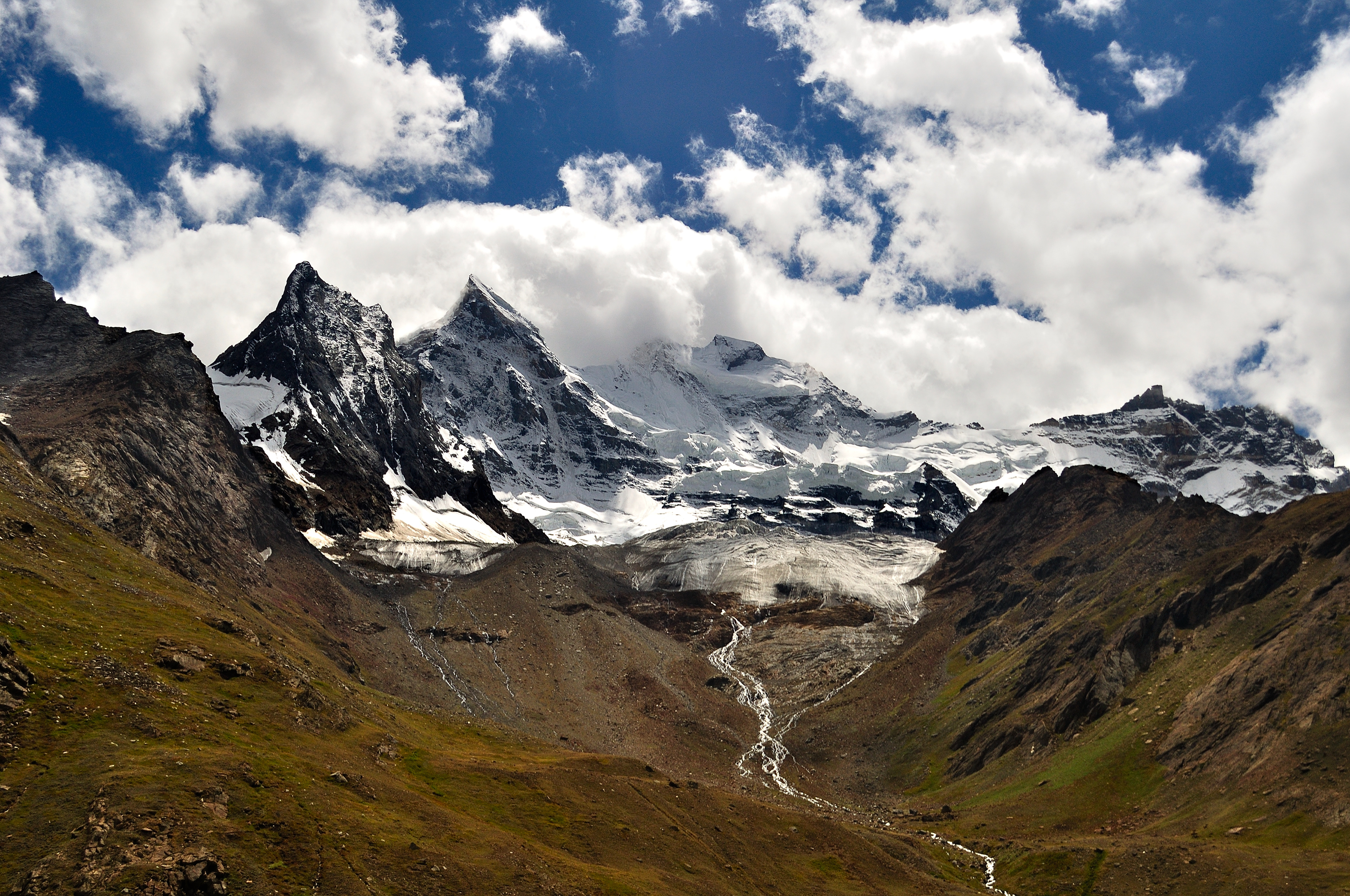 The majestic Nun Kun massif and Parkachik Glacier rising above the Suru Valley, captured on the road from Kargil to Rangdum.