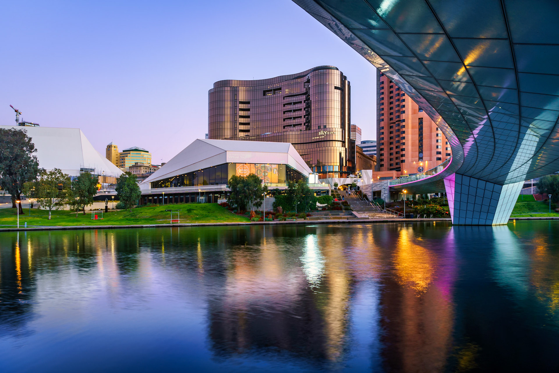 View of the night lights from the bank of the River Torrens in Adelaide.