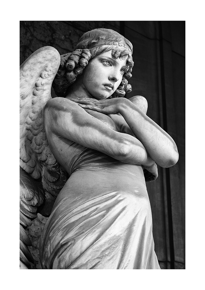 Angel sculpture: The design of the arms, neck and head is admirable, as is the expression full of suffering from ideal face.